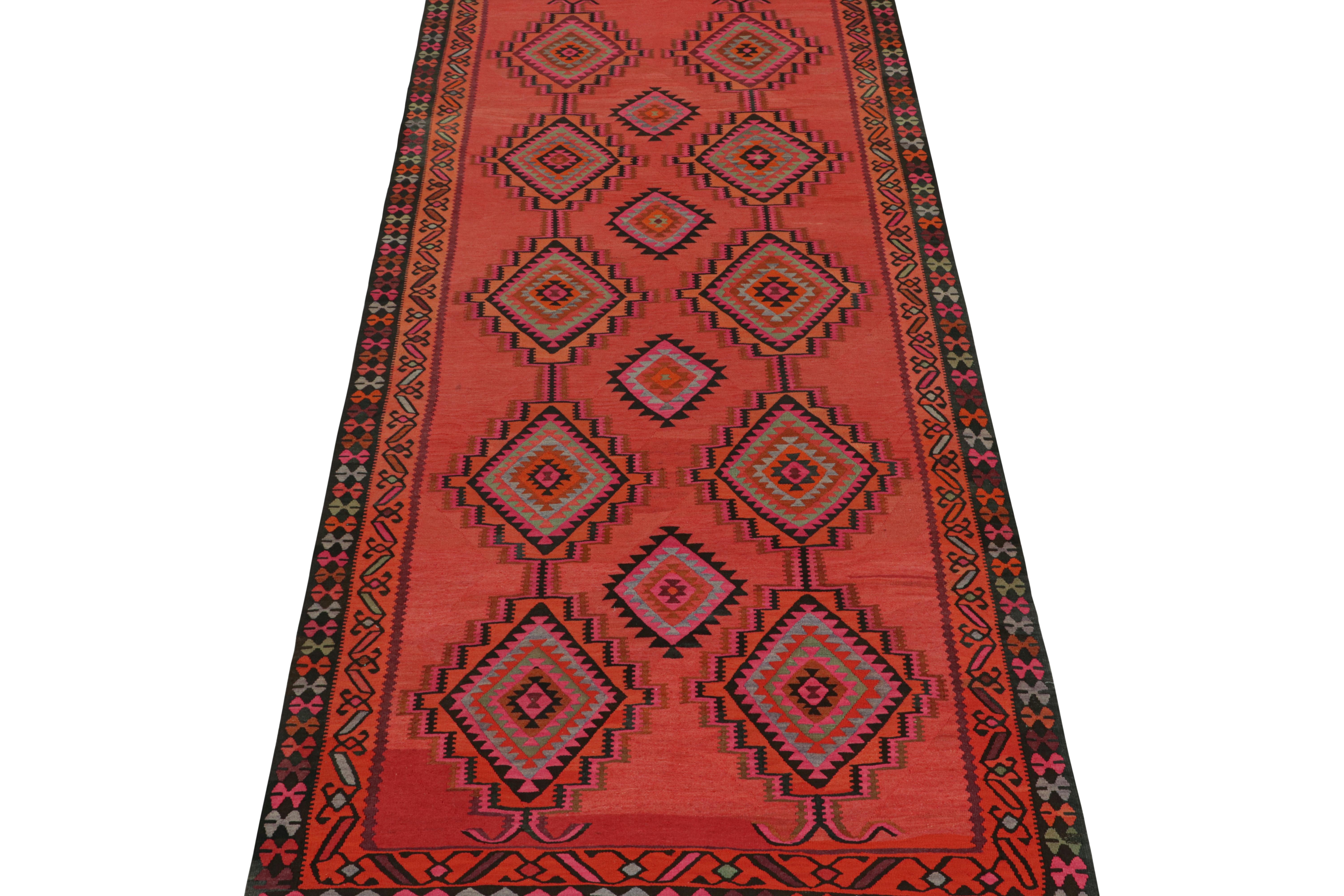 This vintage 6x13 Persian Kilim is a tribal rug from Meshkin—a small northwestern village known for its fabulous works. Handwoven in wool, it originates circa 1950-1960.

Further on the Design:

The bold design prefers a bright red field and black