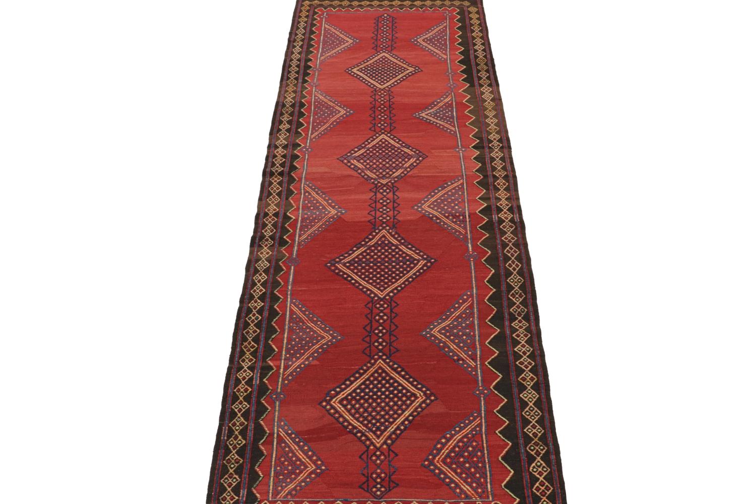 Hand-Knotted Vintage Persian Kilim in Red with Blue Geometric Patterns For Sale