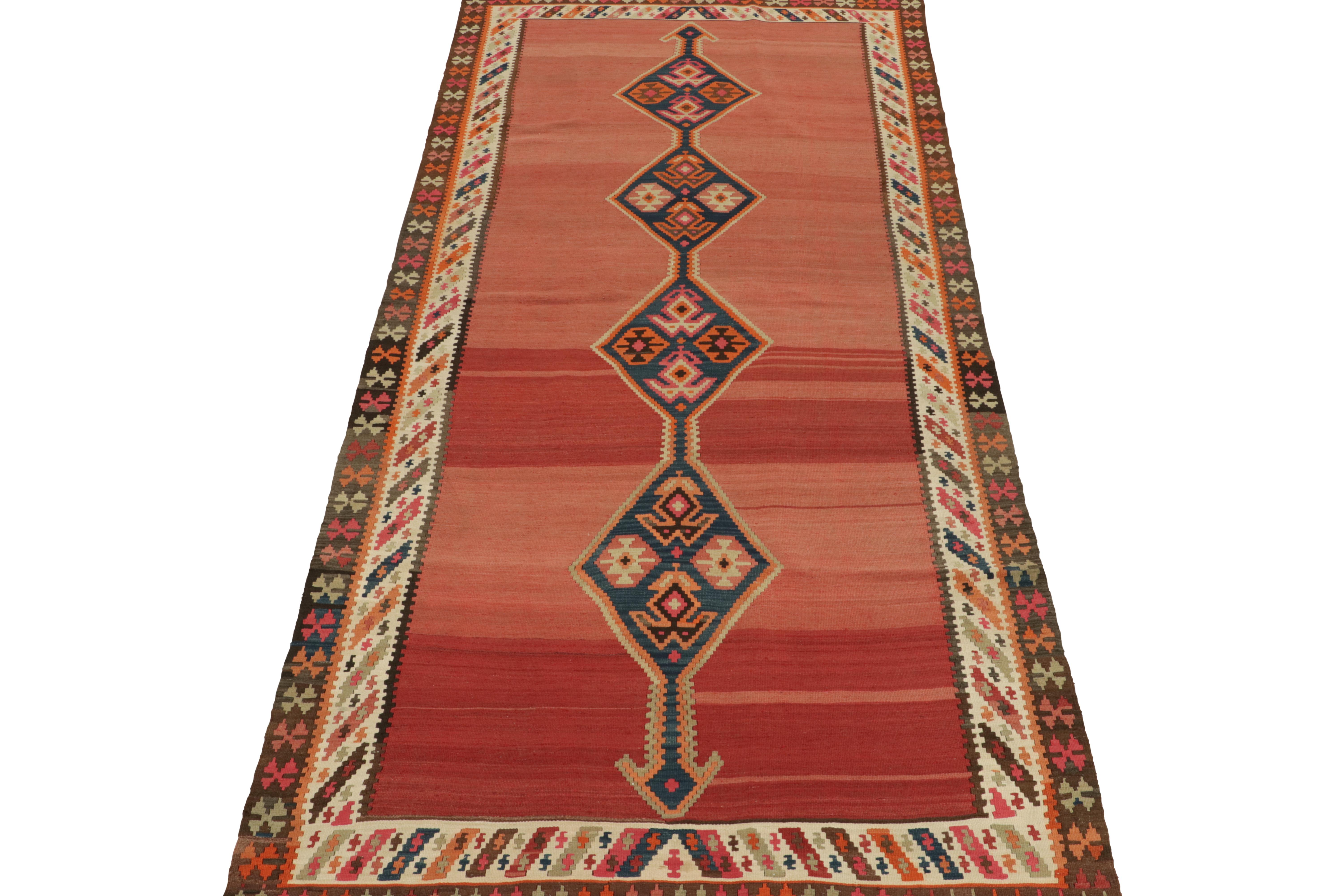Tribal Vintage Persian Kilim in Red with Blue Medallion Pattern by Rug & Kilim For Sale