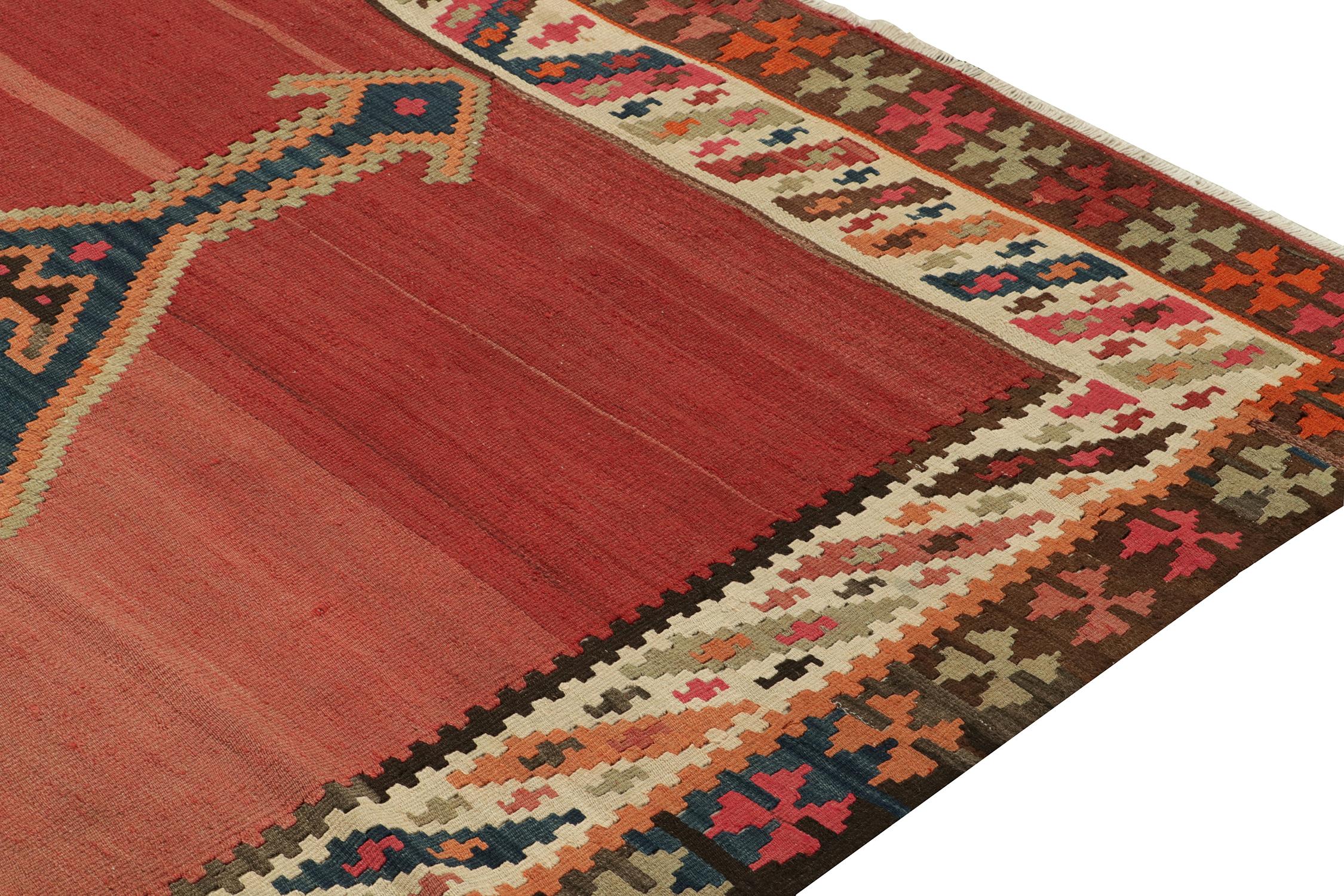 Vintage Persian Kilim in Red with Blue Medallion Pattern by Rug & Kilim In Good Condition For Sale In Long Island City, NY