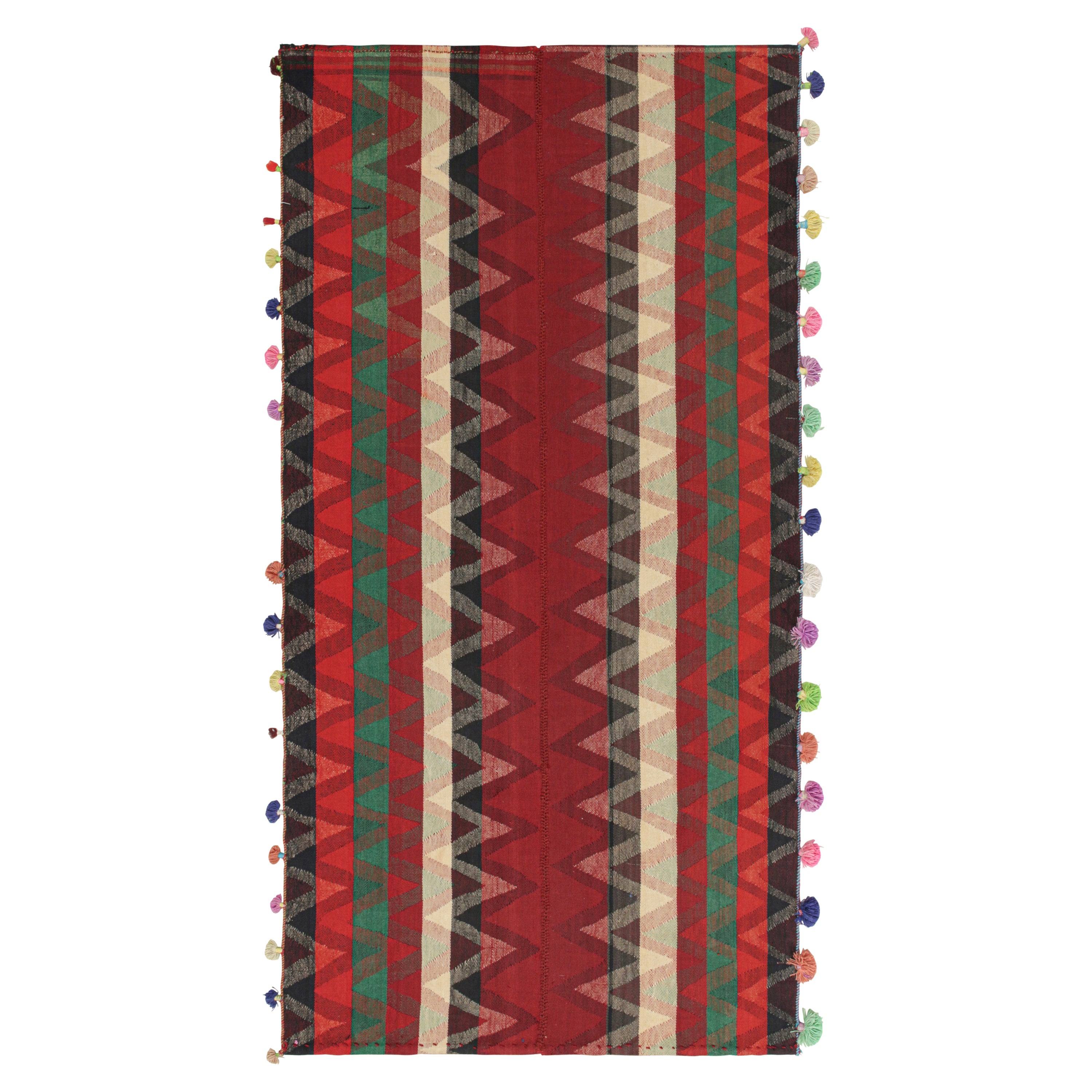 Kilim persiano vintage di colore rosso con strisce multicolore a quadri
