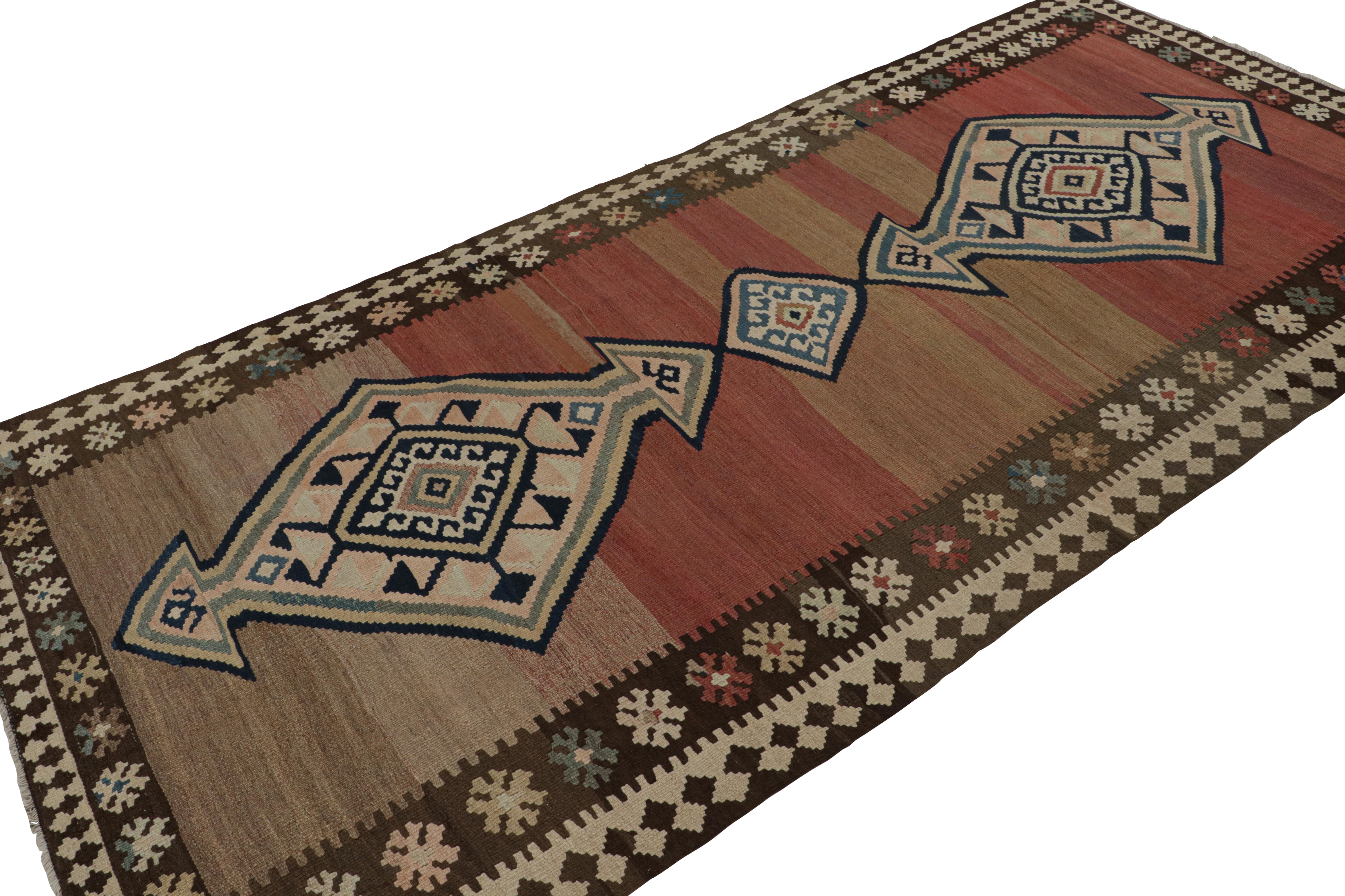 This vintage 5x10 Persian Kilim is a mid-century tribal rug - latest to join our Kilim & Flatweave collection. 

On the Design:

Handwoven in wool circa 1950-1960, the piece carries bold large-scale medallions on an open field with fabulous abrash