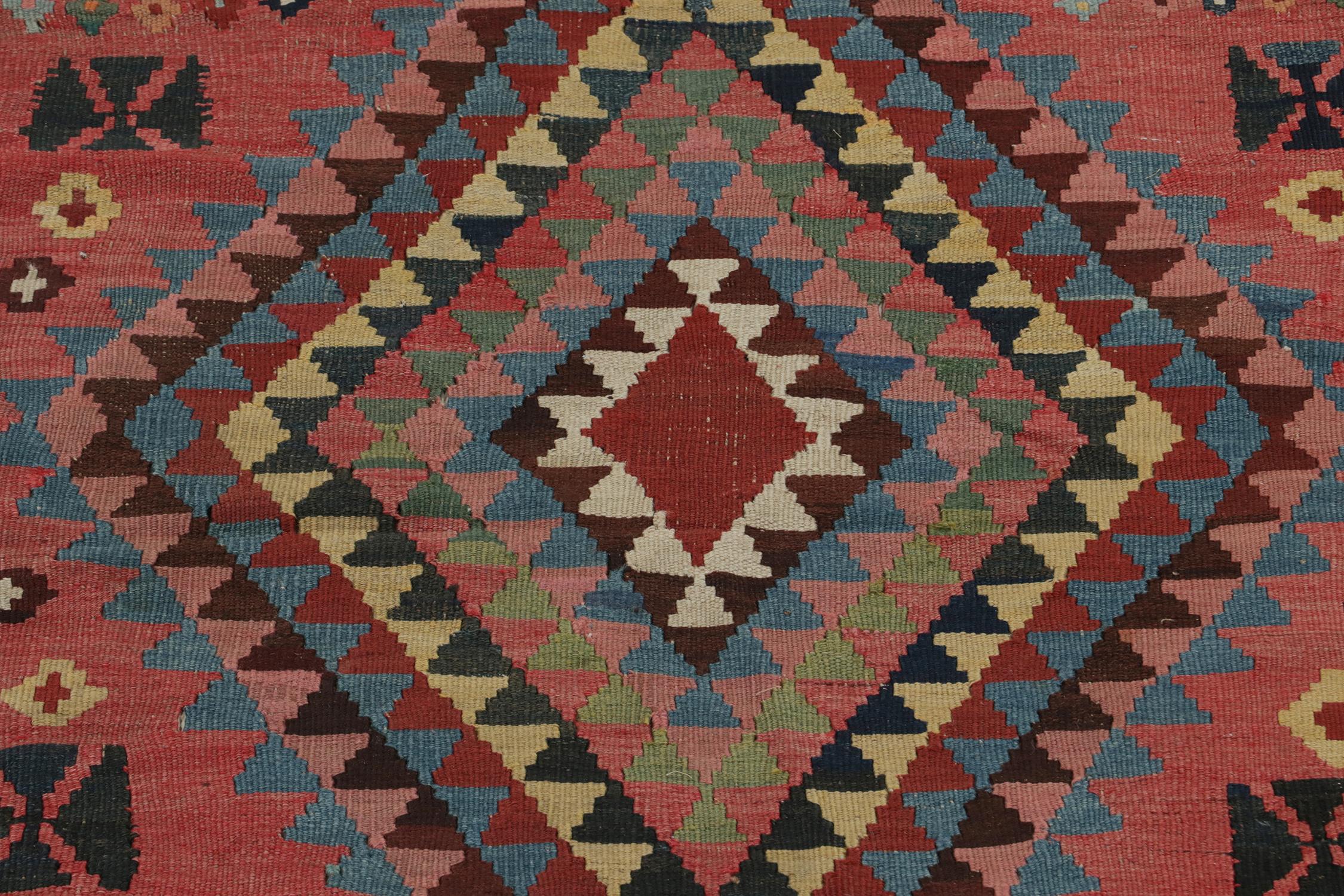 Mid-20th Century Vintage Persian Kilim rug in Pink with Geometric Patterns For Sale