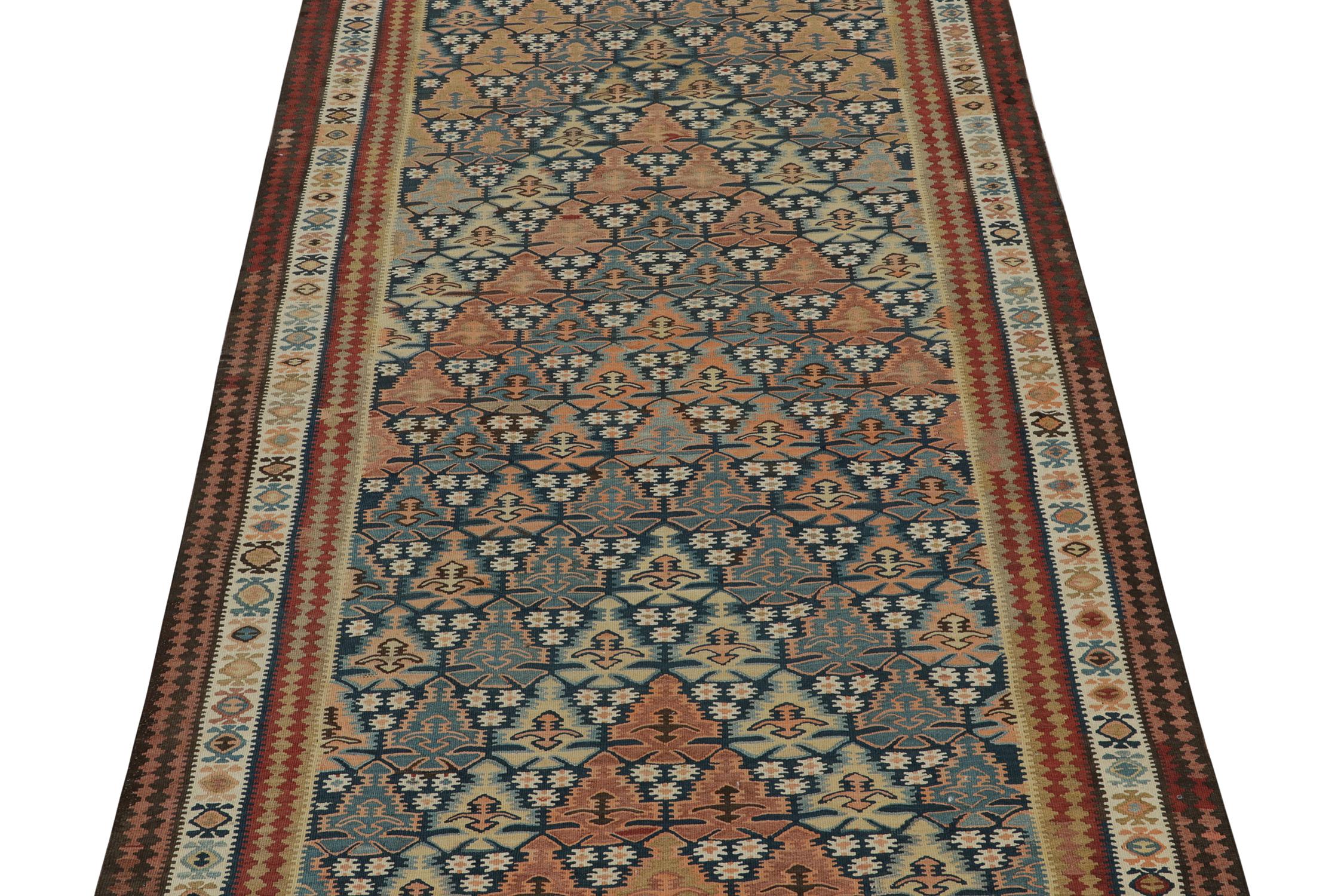 Tribal Vintage Persian Kilim rug in Polychromatic Geometric Patterns For Sale