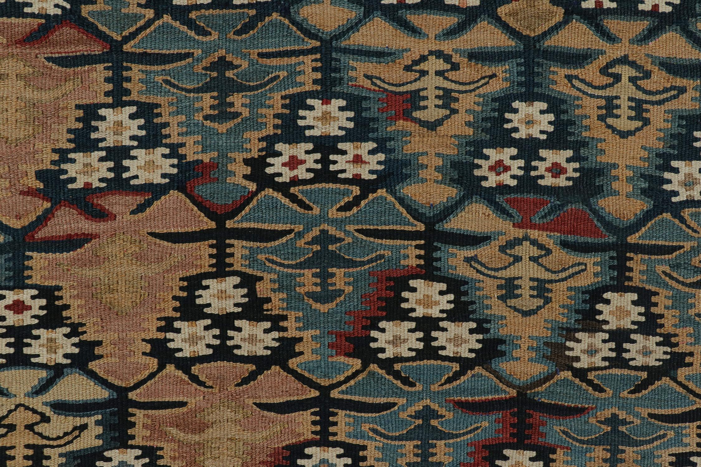 Mid-20th Century Vintage Persian Kilim rug in Polychromatic Geometric Patterns For Sale