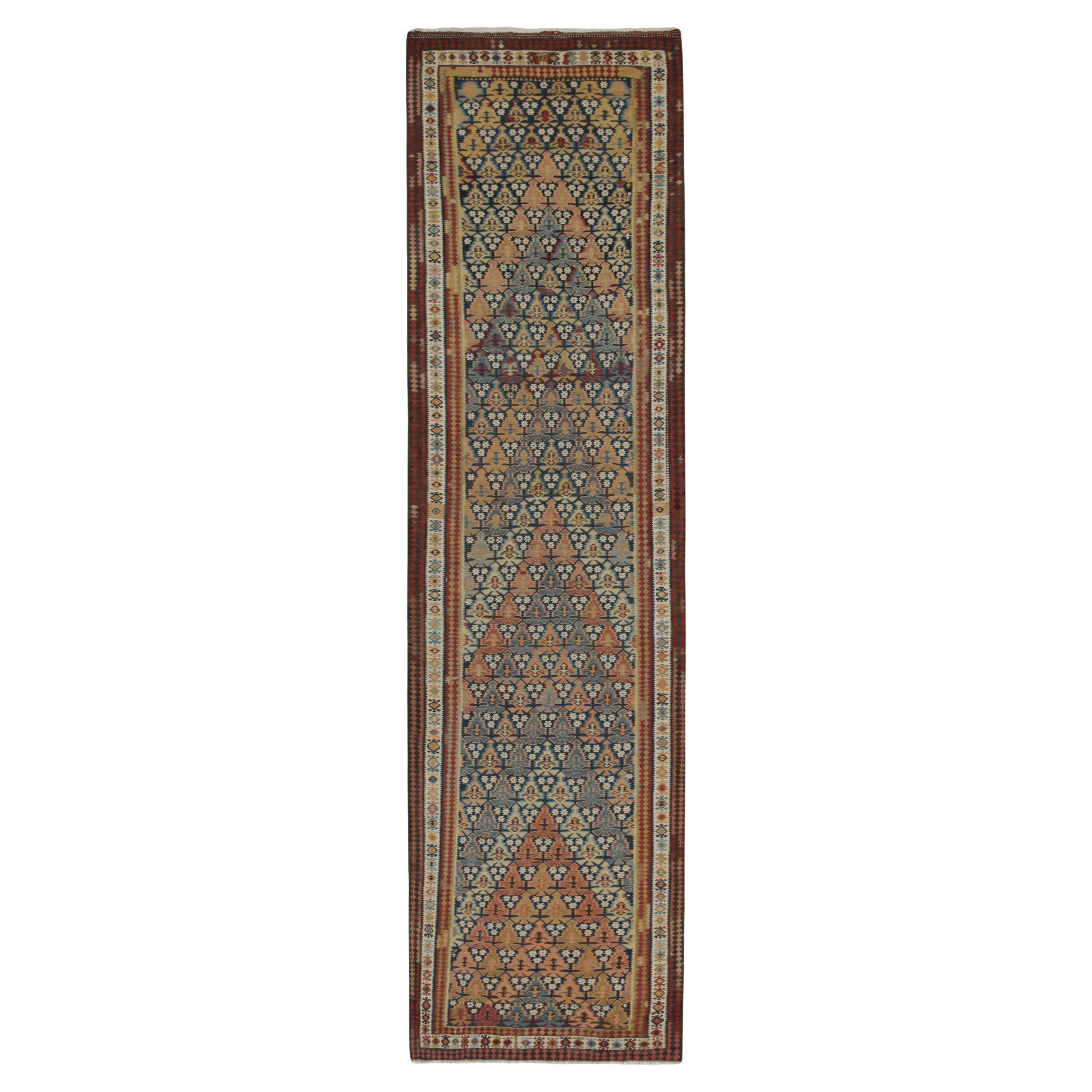 Vintage Persian Kilim rug in Polychromatic Geometric Patterns