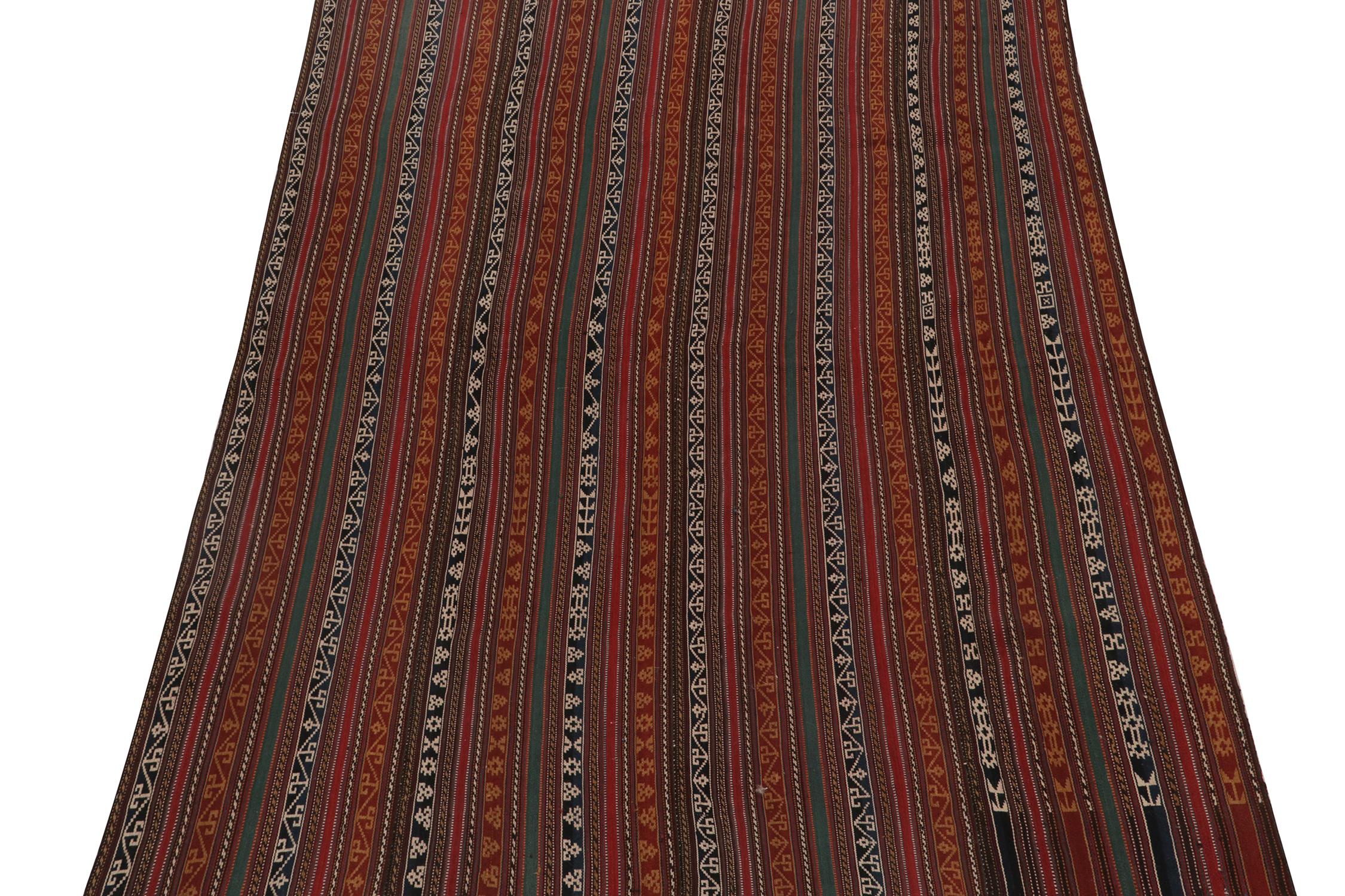 Tribal Vintage Persian Kilim Rug in Polychromatic Striped Patterns by Rug & Kilim For Sale