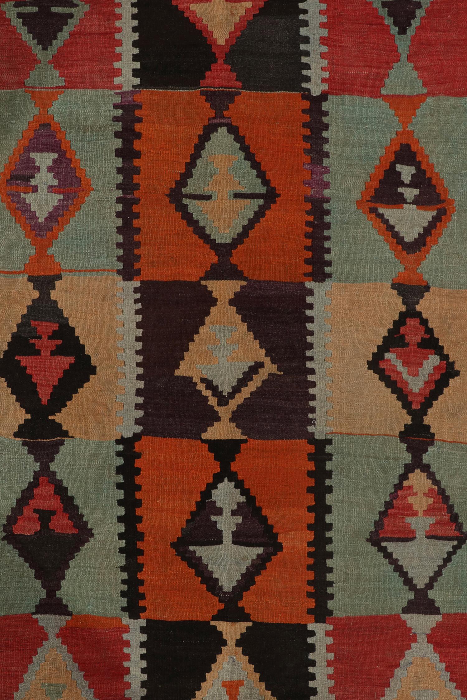 Wool Vintage Persian Kilim rug in Red, Orange Tribal Geometric Pattern by Rug & Kilim For Sale