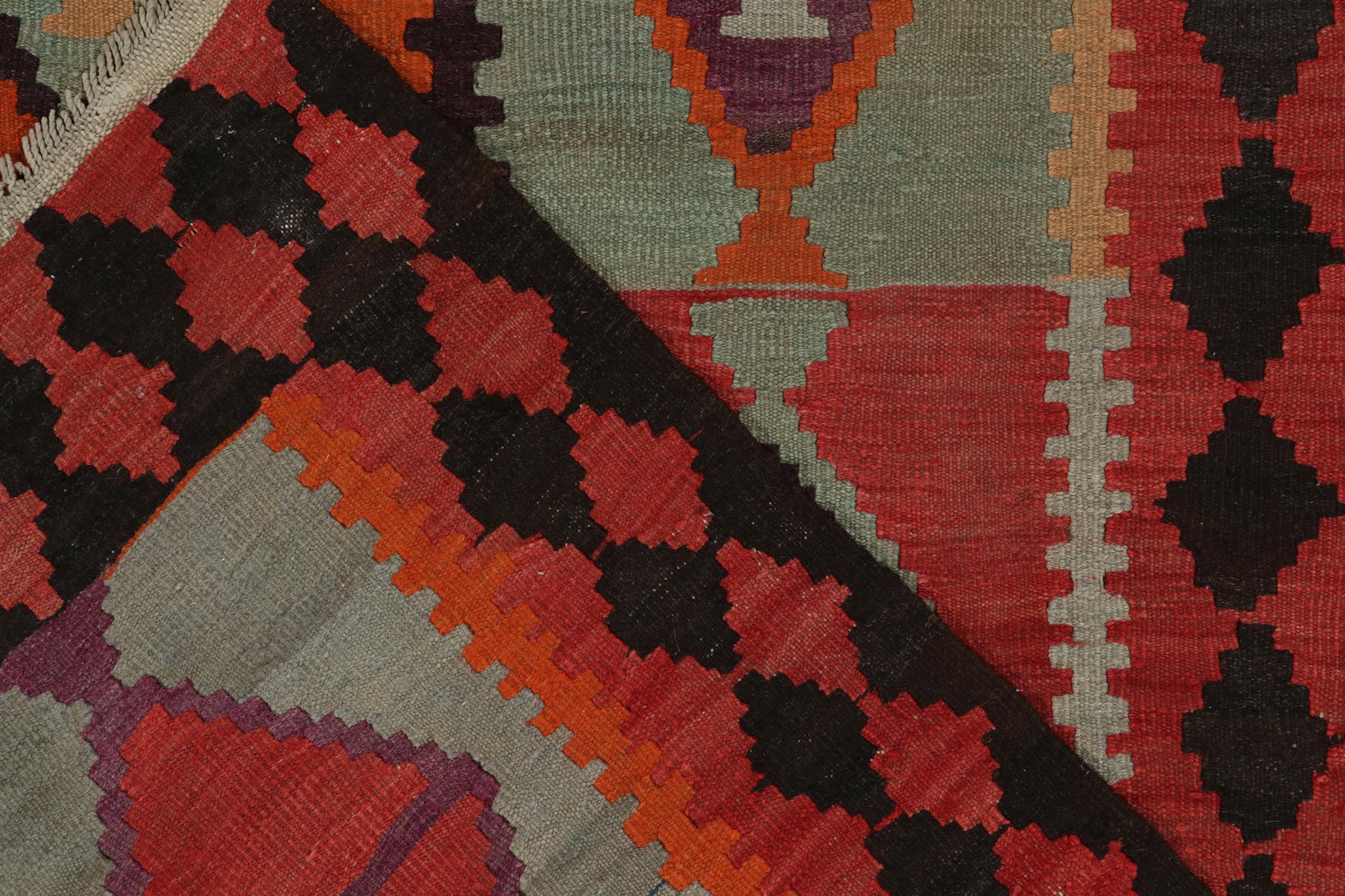 Vintage Persian Kilim rug in Red, Orange Tribal Geometric Pattern by Rug & Kilim For Sale 1