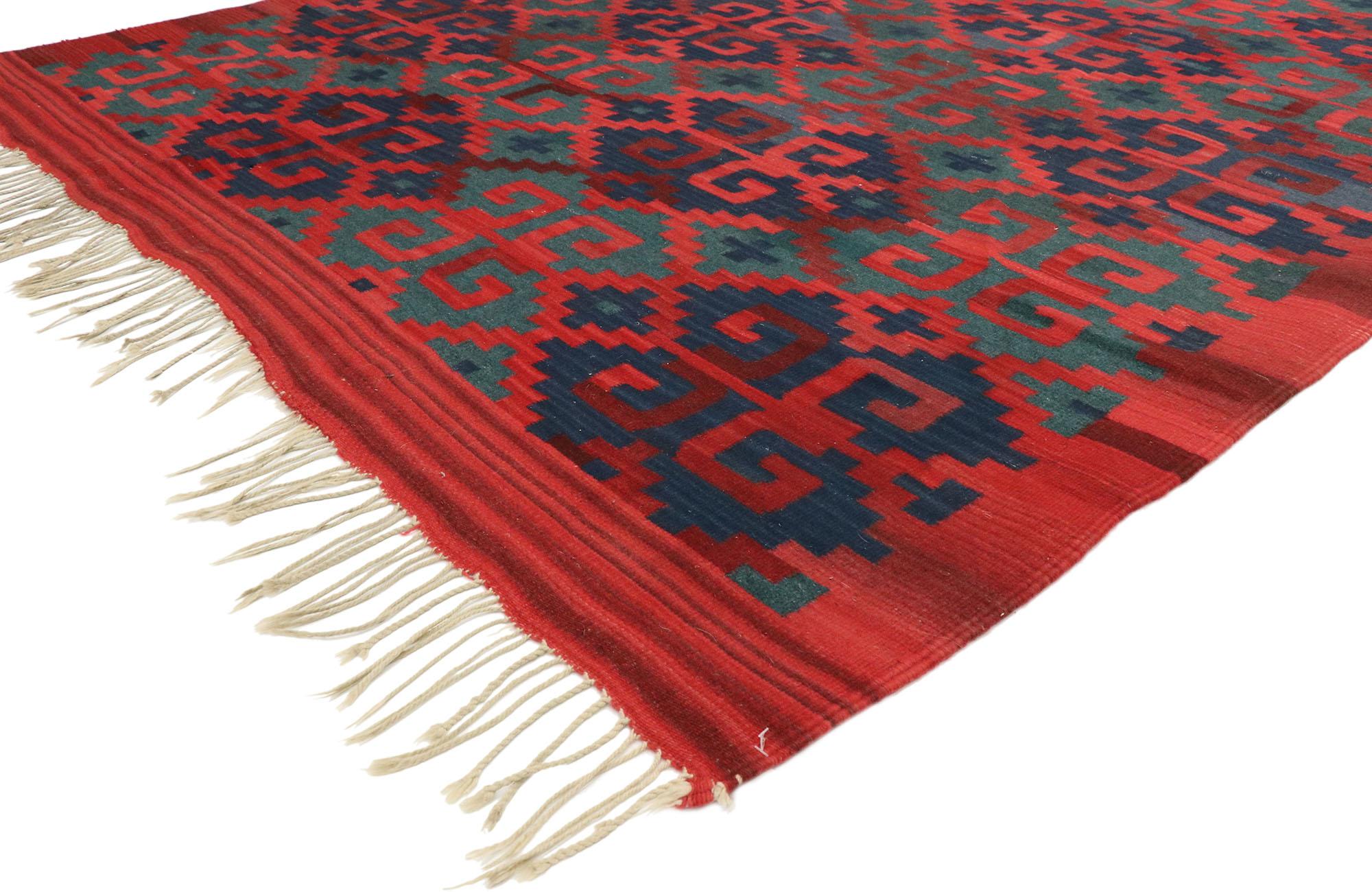 74962, Vintage Persian Kilim Rug with Modern Northwestern Tribal Style. Down-to-earth vibes and rustic sensibility meet Modern Northwestern Tribal style in this handwoven wool vintage Persian Kilim rug. The abrashed red field features an all-over