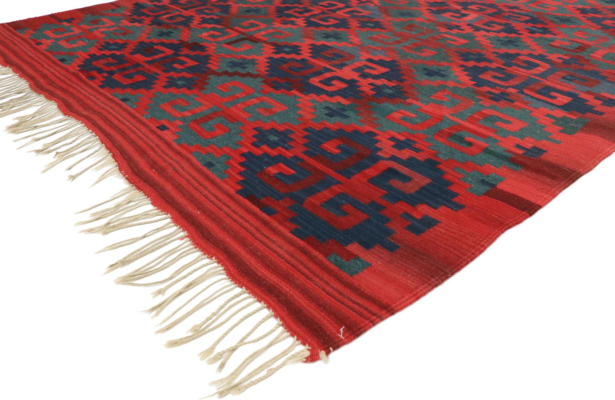 74962, Vintage Persian Kilim Rug with Modern Northwestern Tribal Style. Down-to-earth vibes and rustic sensibility meet Modern Northwestern Tribal style in this handwoven wool vintage Persian Kilim rug. The abrashed red field features an all-over