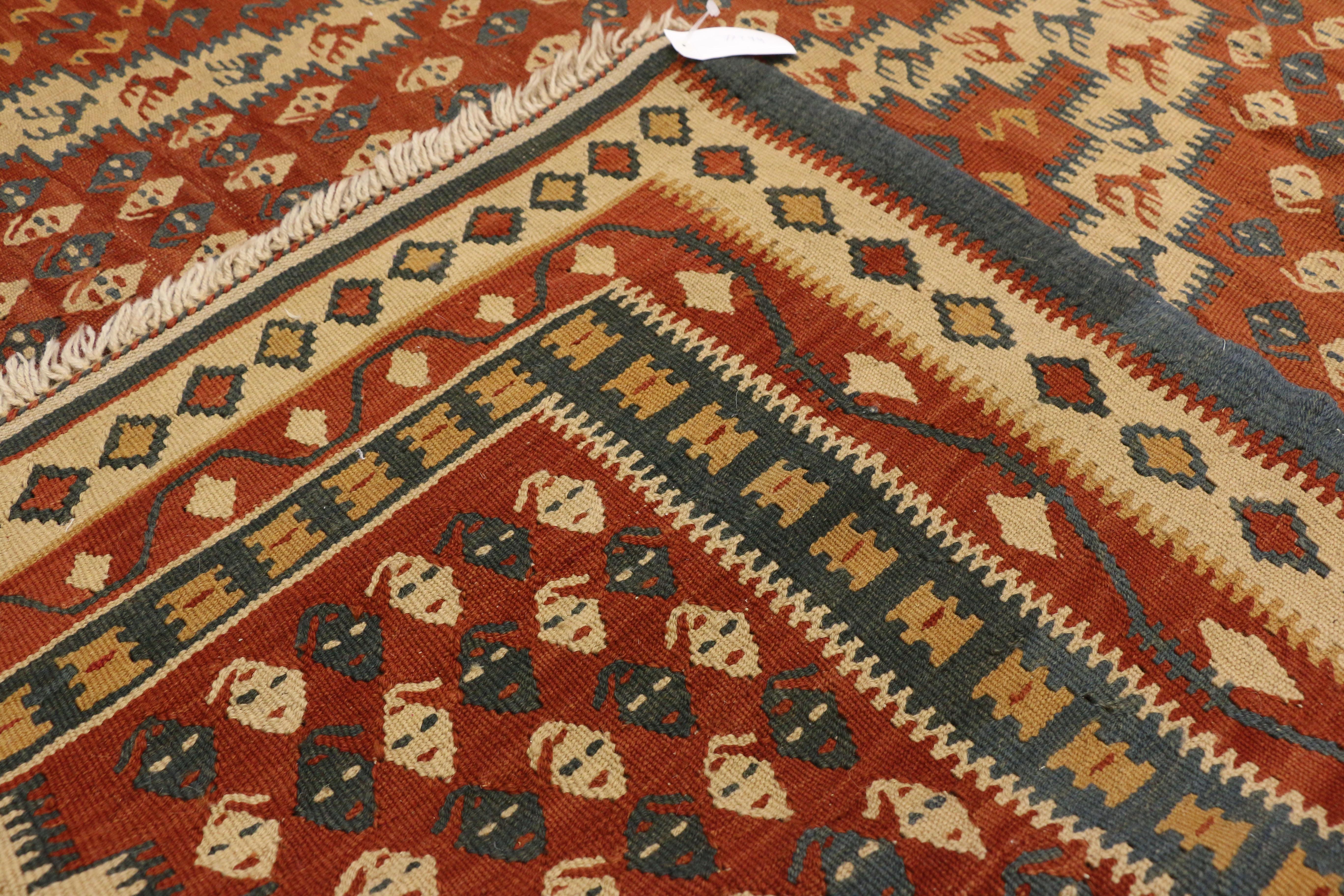 20th Century Vintage Persian Kilim Rug with Nomadic Tribal Style For Sale