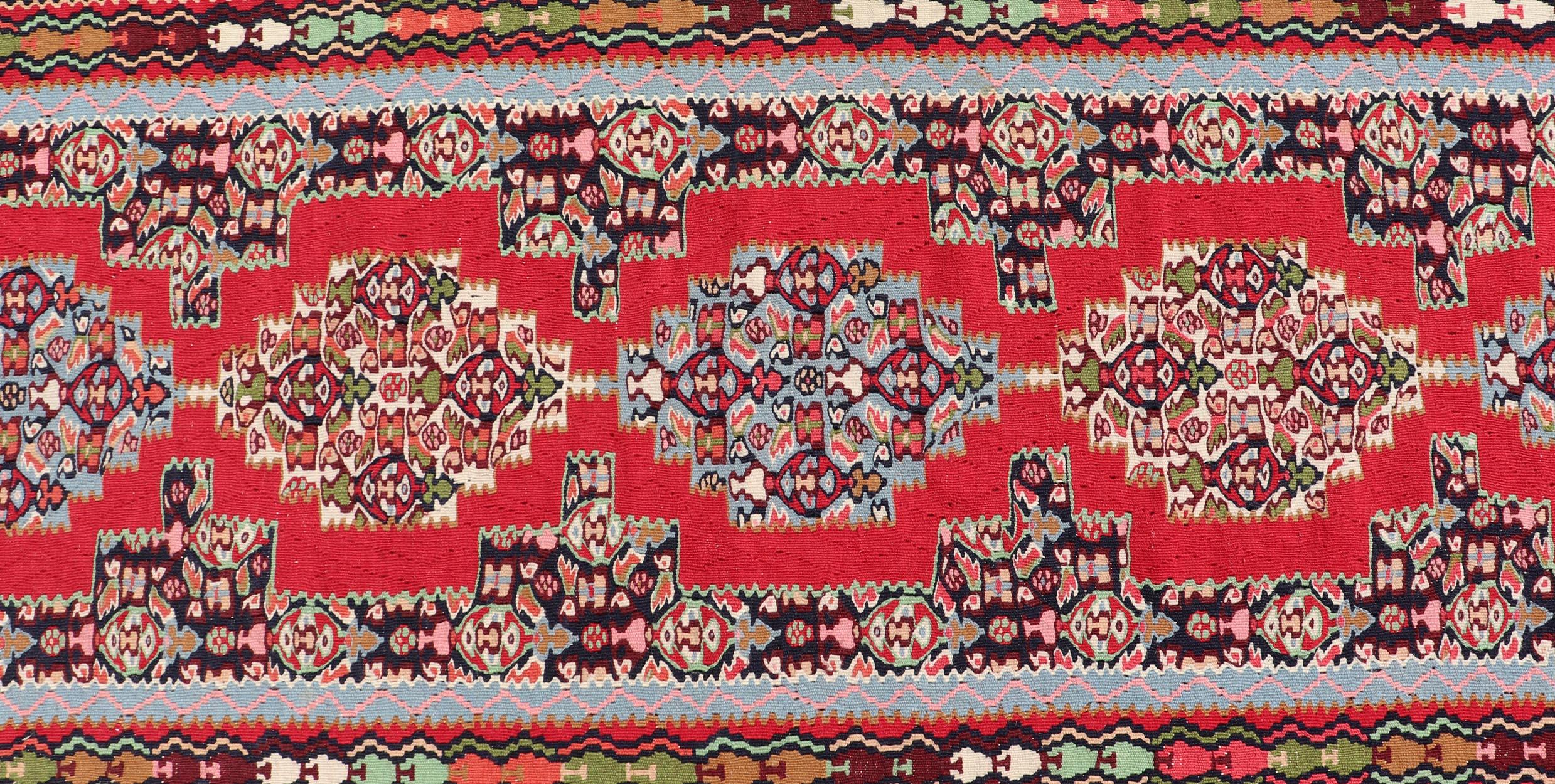 Wool Vintage Persian Kilim Rug with Vibrant Red Field and Accents of Light 2'7 x 12'2 For Sale