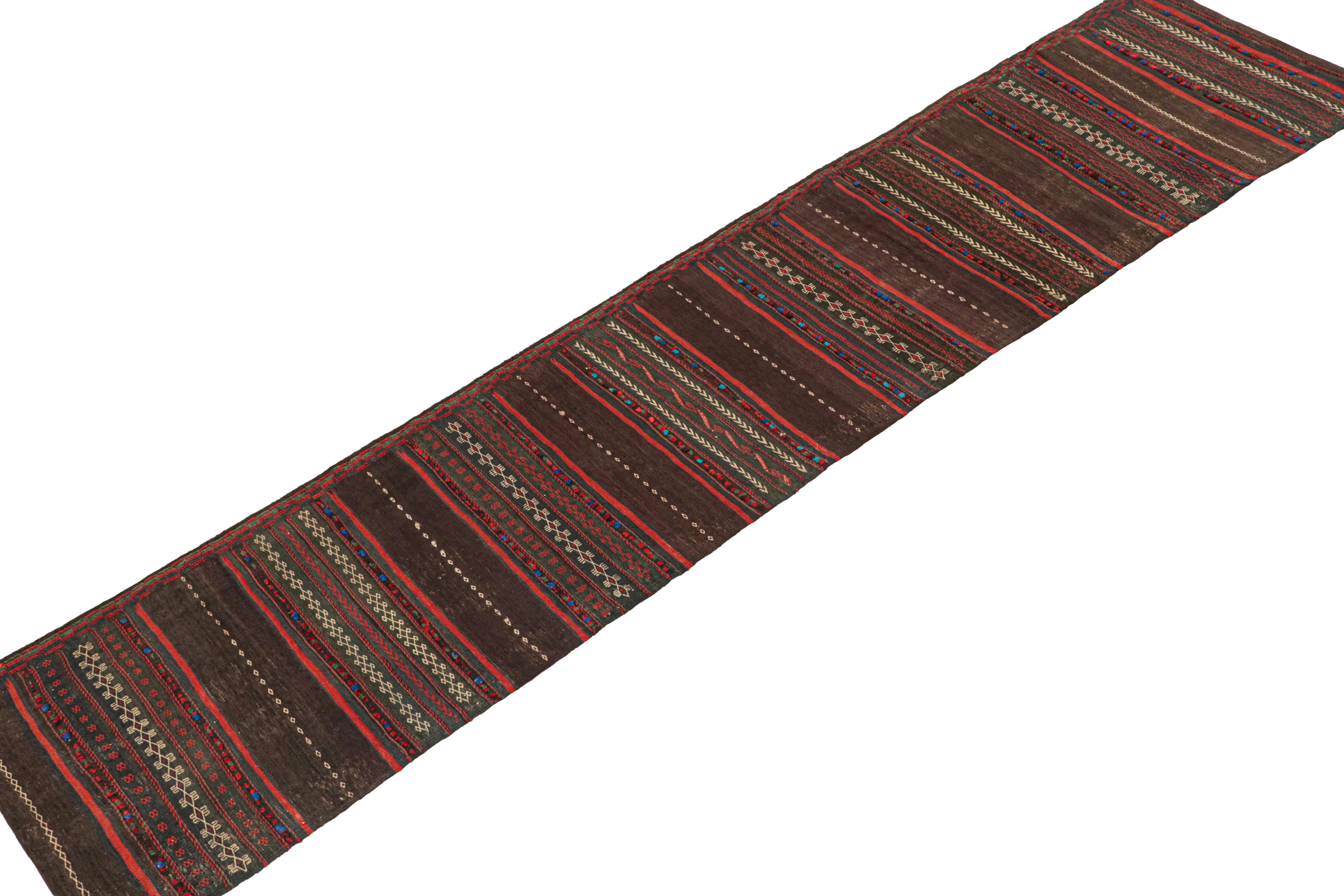 Tribal Vintage Persian Kilim Runner in Aubergine with Red Stripes by Rug & Kilim For Sale