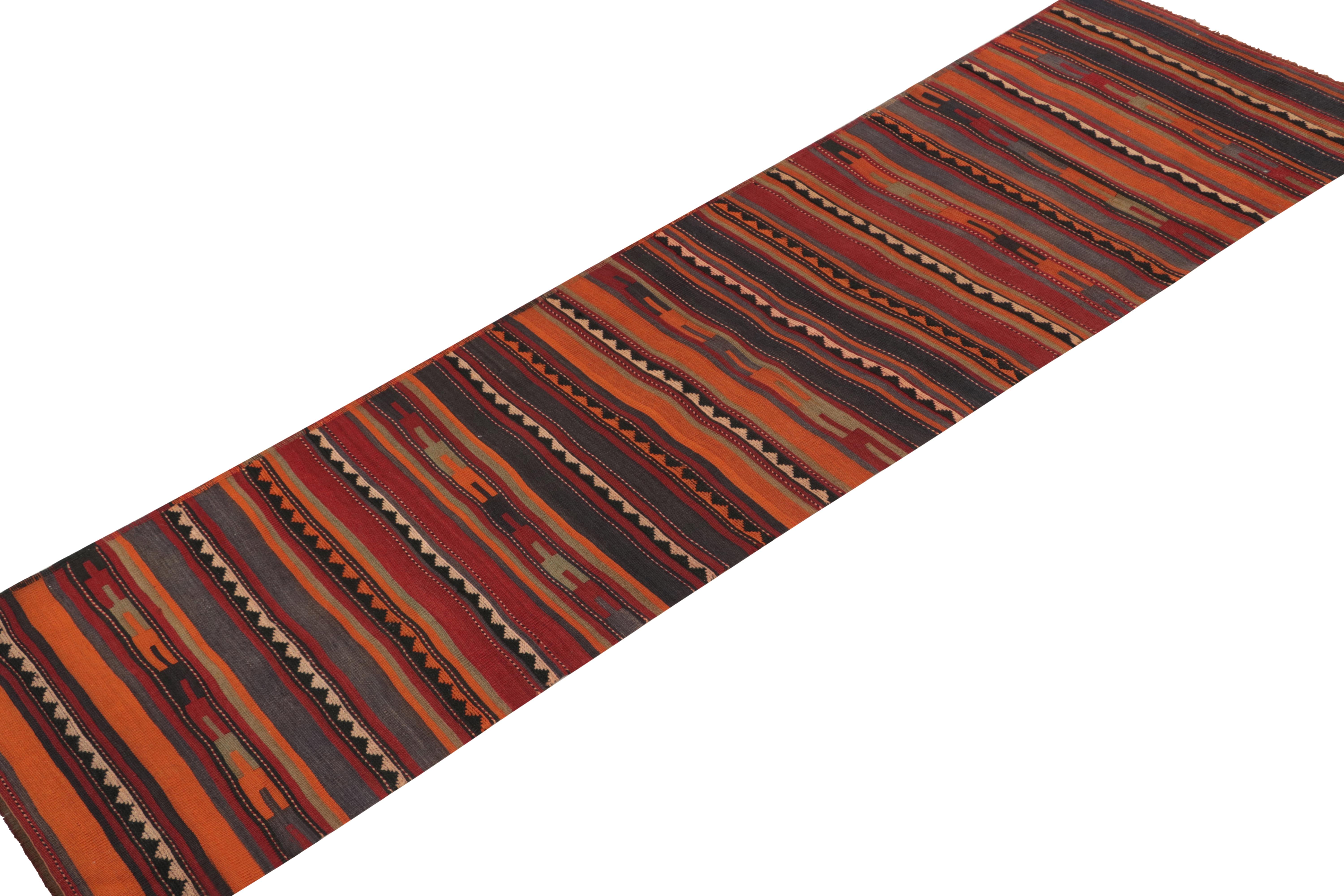 Tribal Vintage Persian Kilim Runner in Orange with Geometric Patterns by Rug & Kilim For Sale