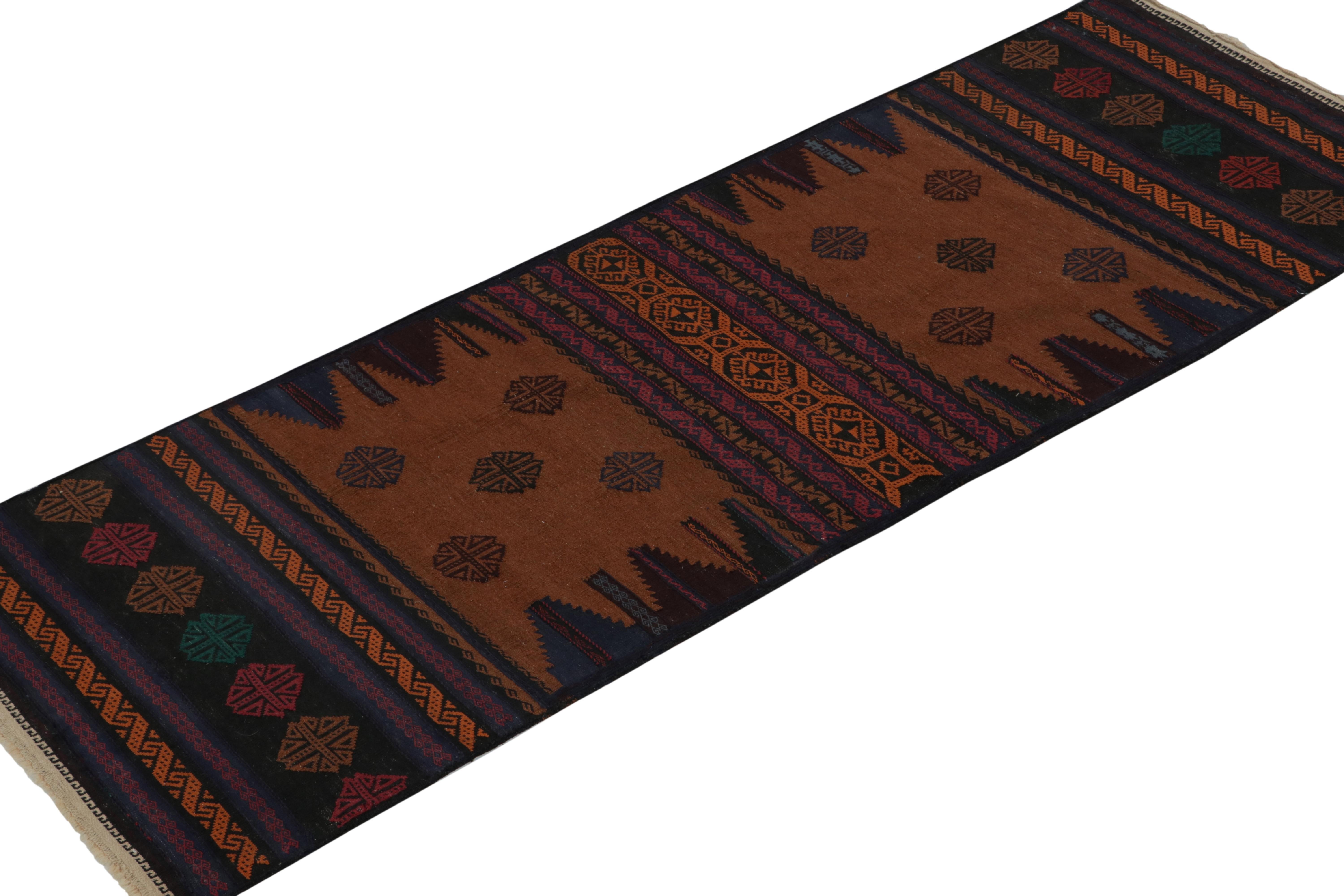 Tribal Vintage Persian Kilim Runner in Polychromatic Geometric Patterns by Rug & Kilim For Sale