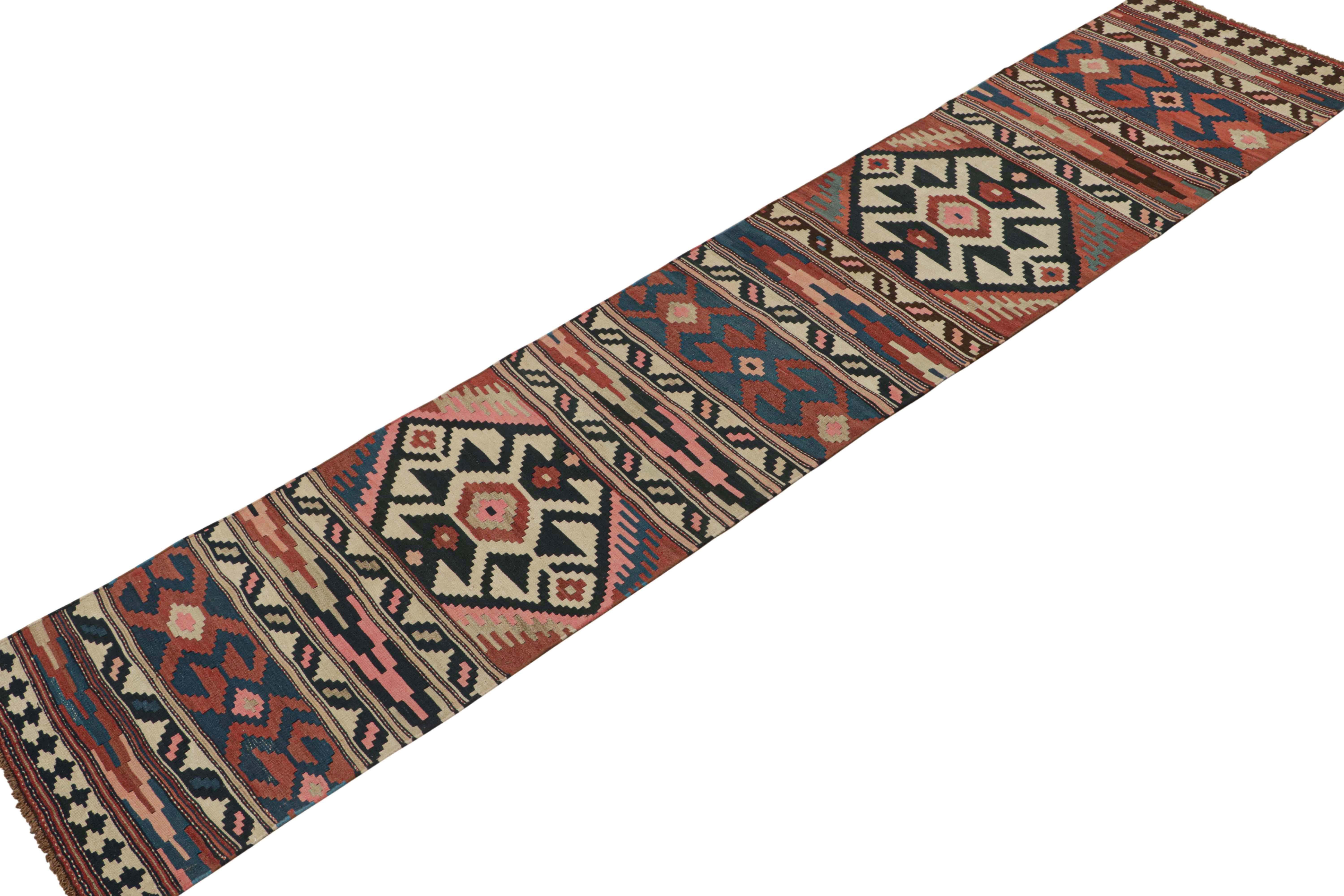 Tribal Vintage Persian Kilim Runner in Polychromatic Geometric Patterns