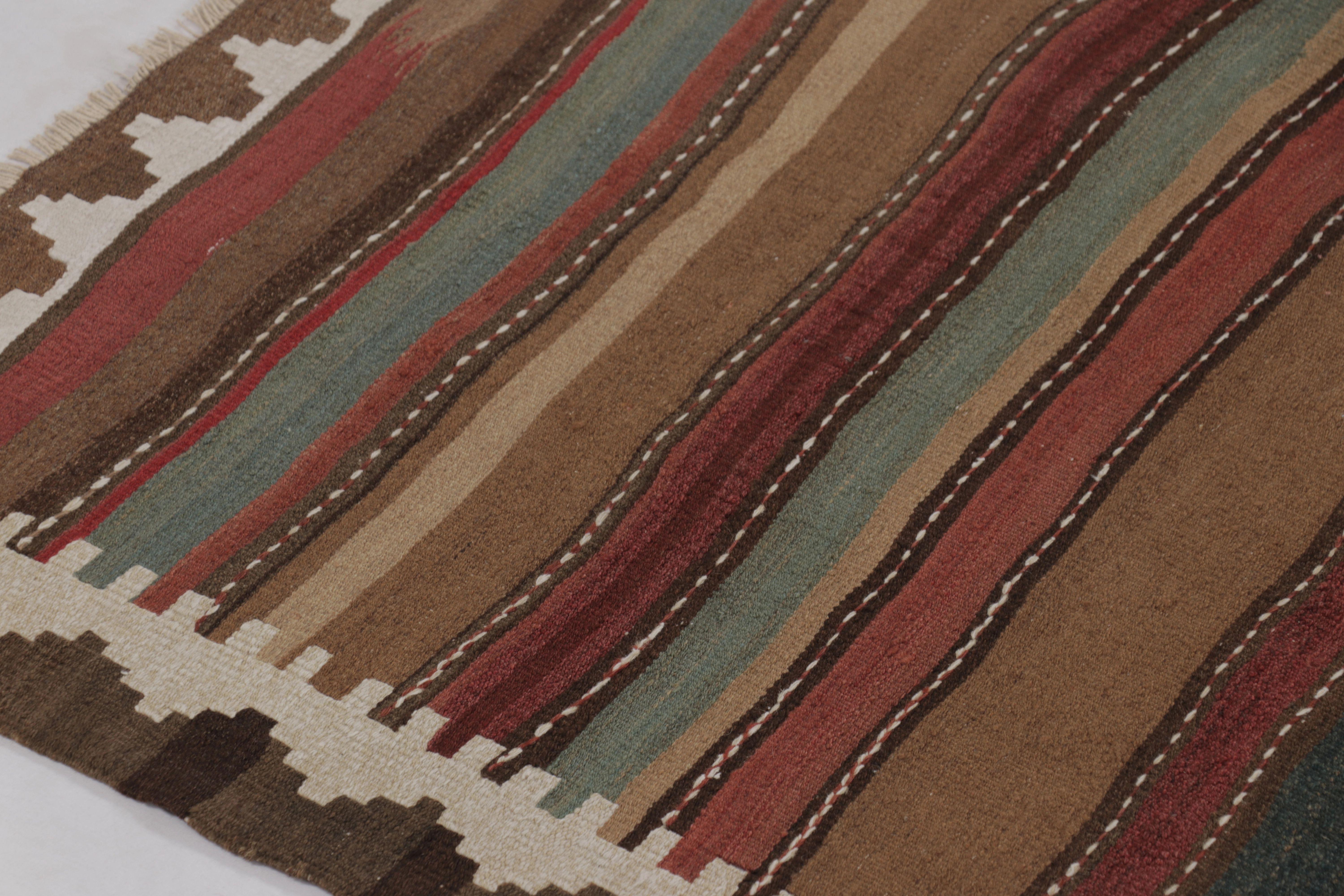 Made with handwoven wool circa 1950-1960, this 6x12 vintage flat-weave gallery runner Kilim is a particularly atmospheric and sought-after work of an exciting new curation from Rug & Kilim’s collection of classic kilims and flatweaves.

On the