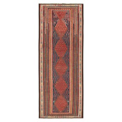 Kilim persiano vintage con medaglioni rossi e motivi geometrici di Rug & Kilim