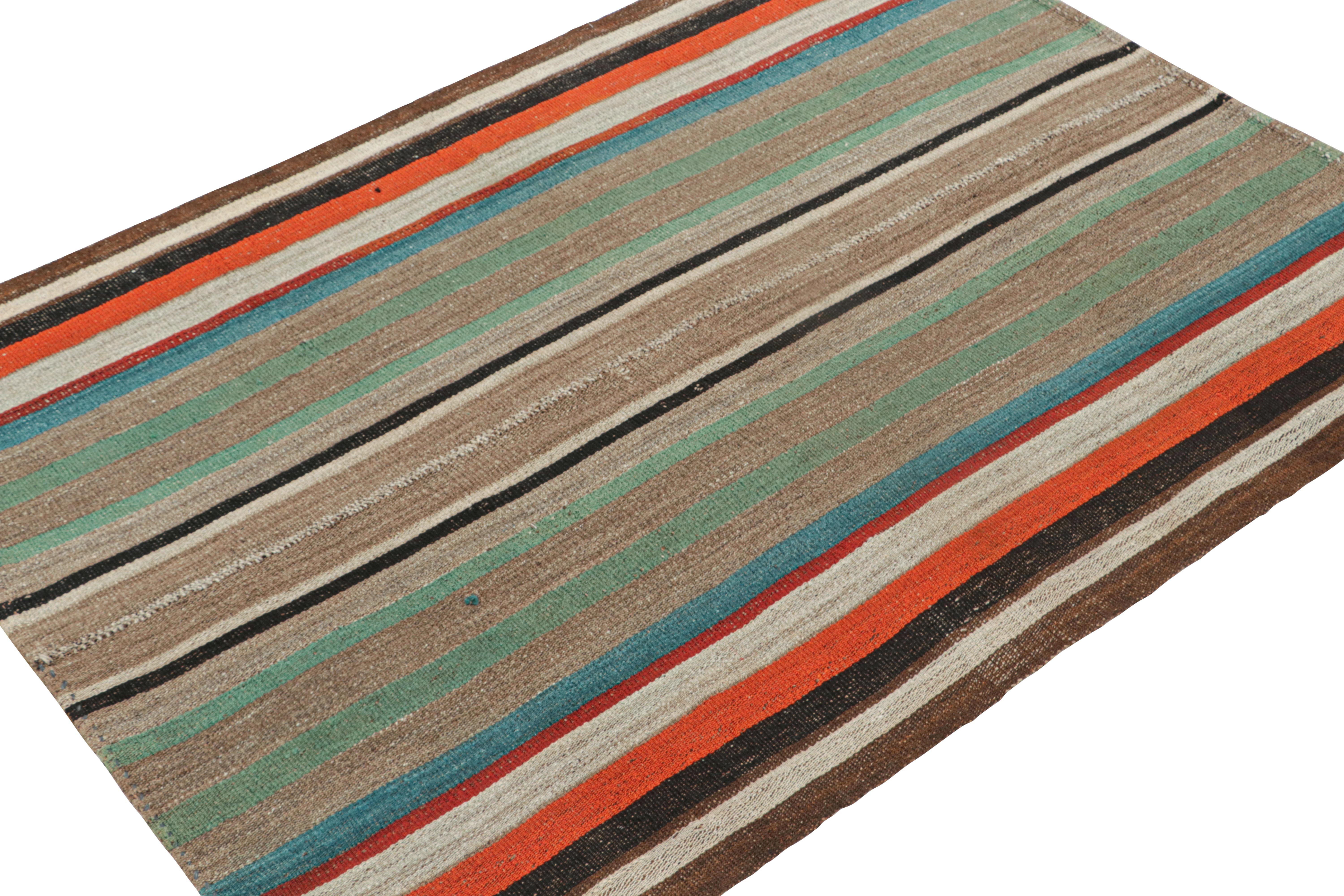 Tribal Vintage Persian Kilim with Vibrant Polychromatic Stripes For Sale