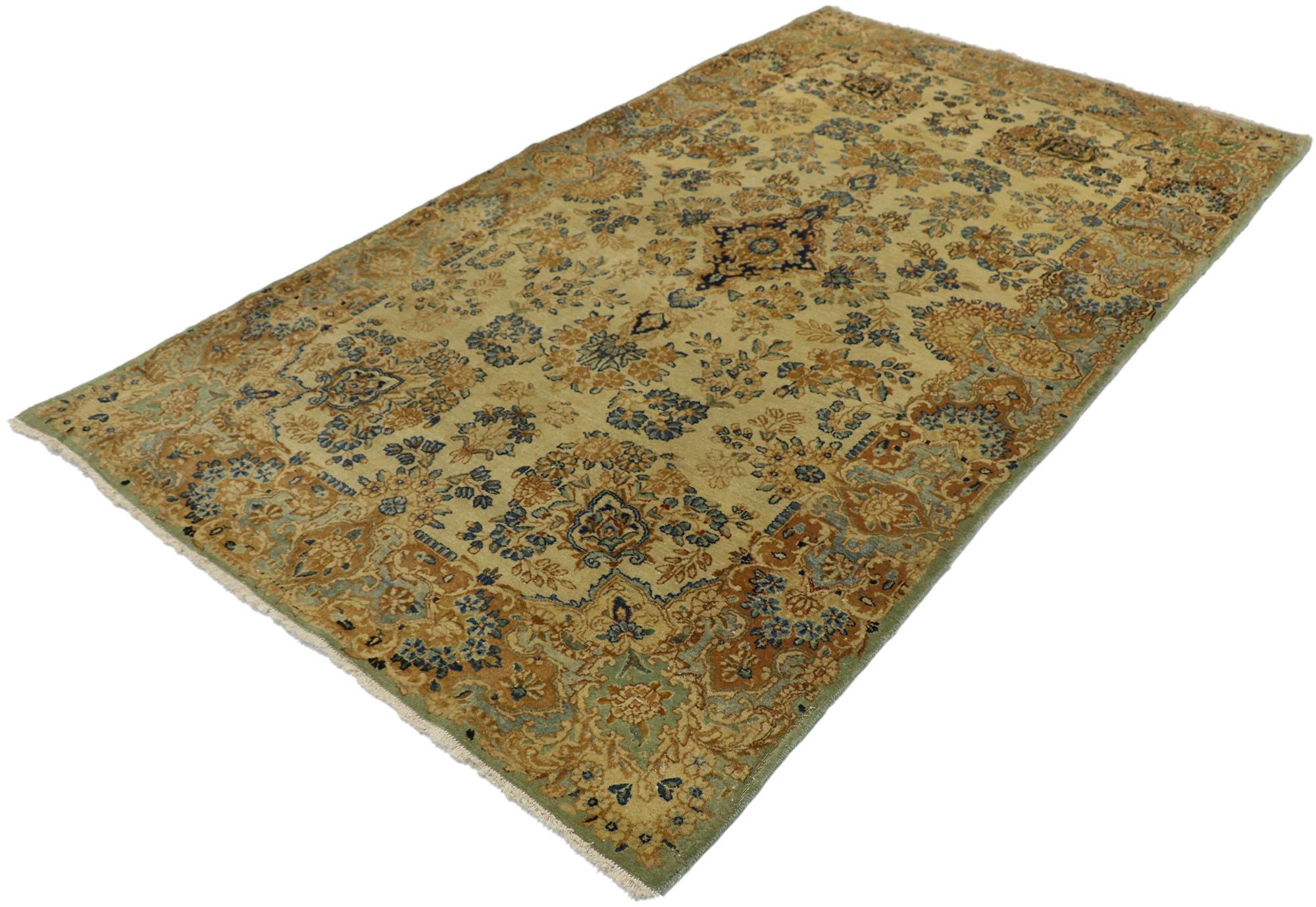 72996, vintage Persian Kirman rug, Persian Kerman rug. With an impressive array of realistic floral elements and a refined color palette, this hand knotted wool vintage Persian Kerman rug charms with ease and beautifully embodies shabby chic rustic