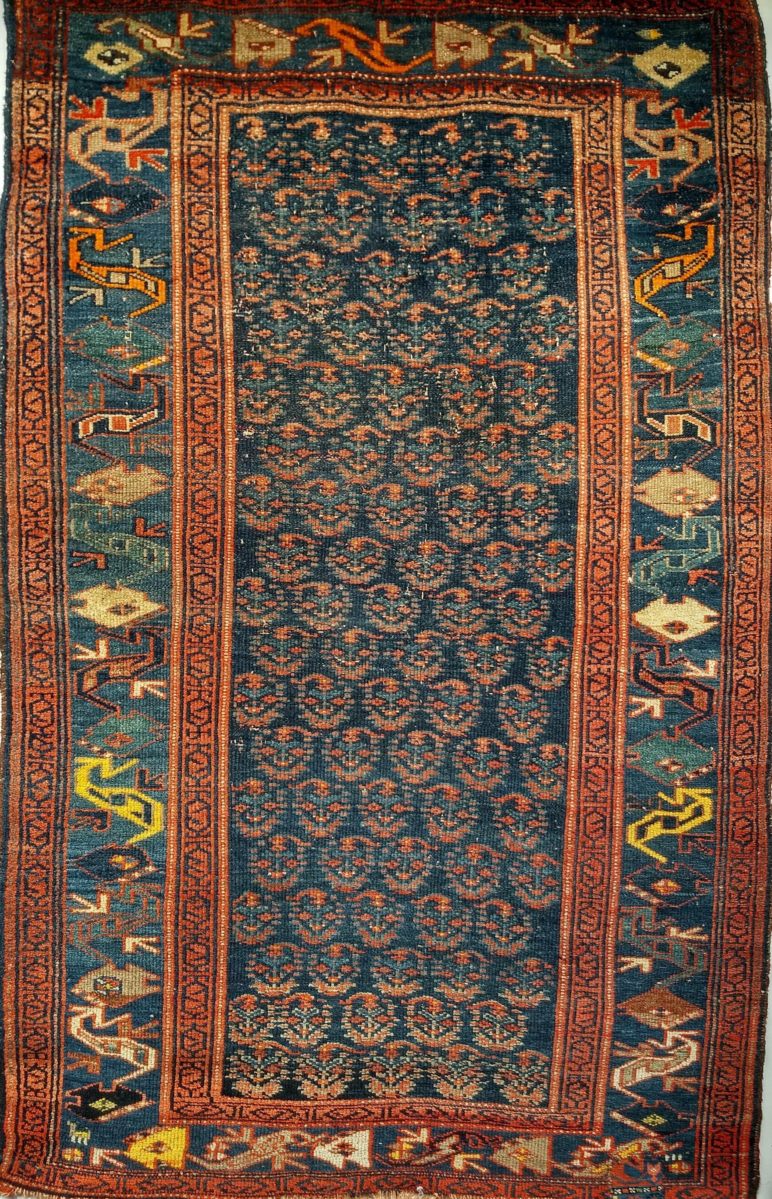 green and blue persian rug