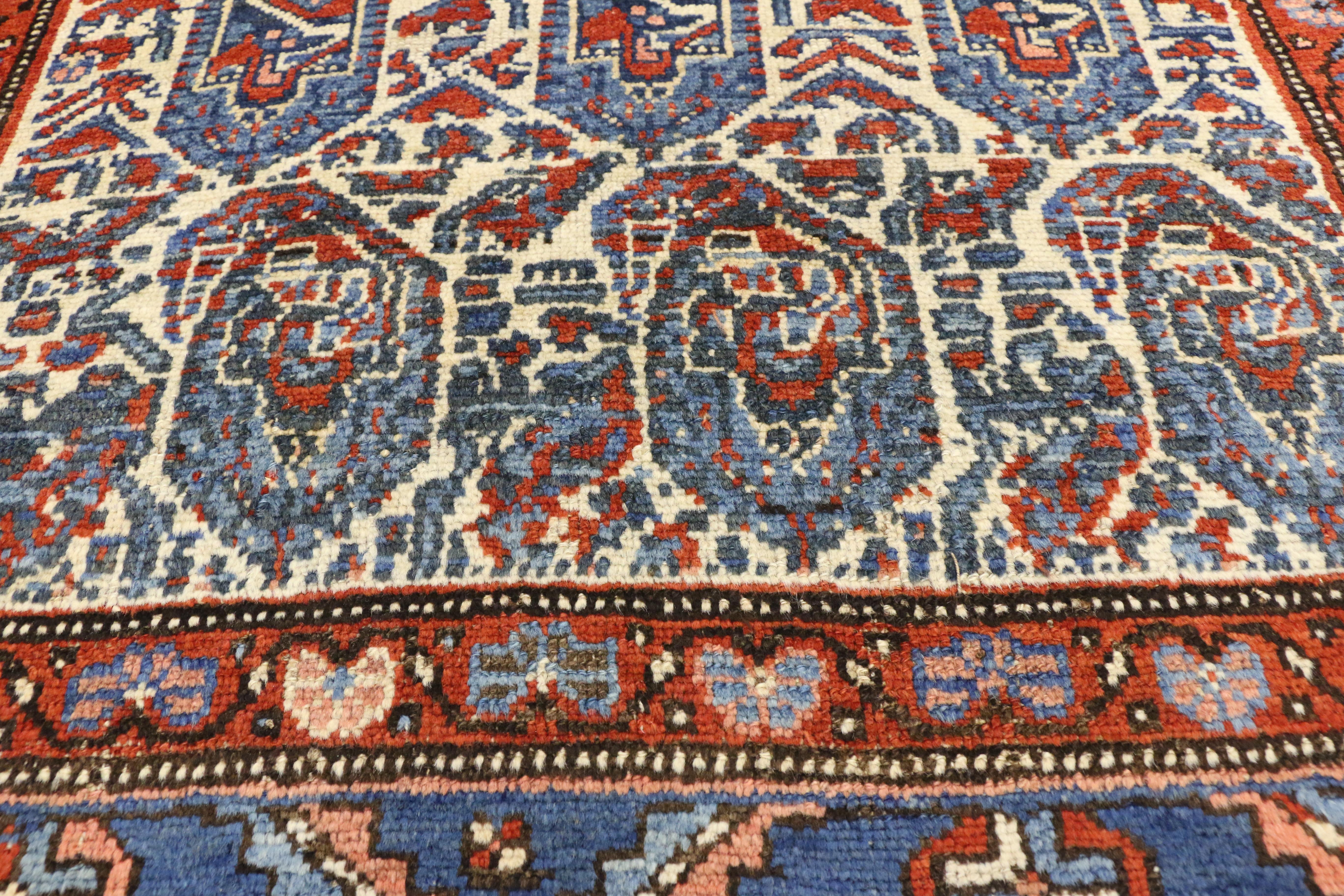 Persischer kurdischer Teppich mit blauem Boteh-Muster aus Persien (Stammeskunst) im Angebot