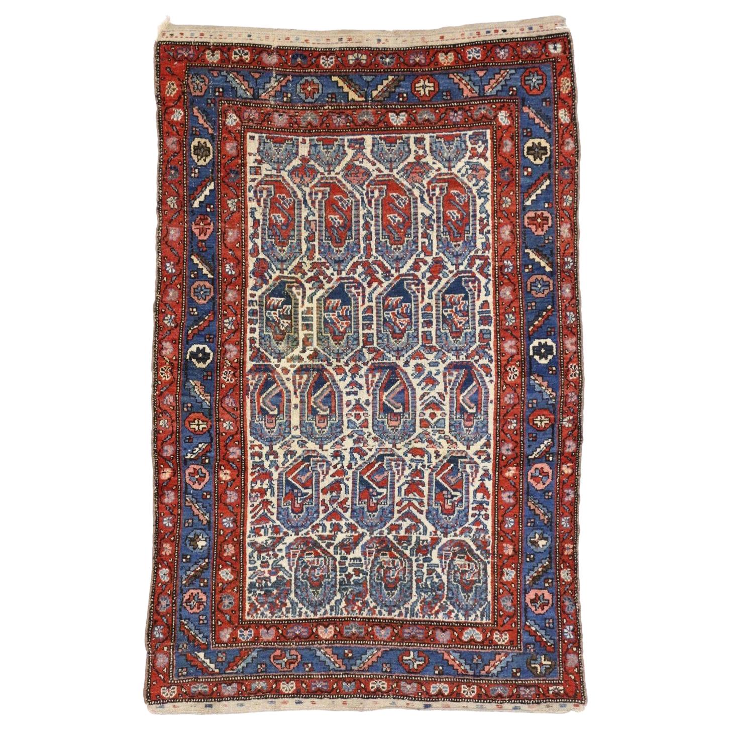 Vintage Persian Kurdish Rug with Blue Boteh Pattern For Sale