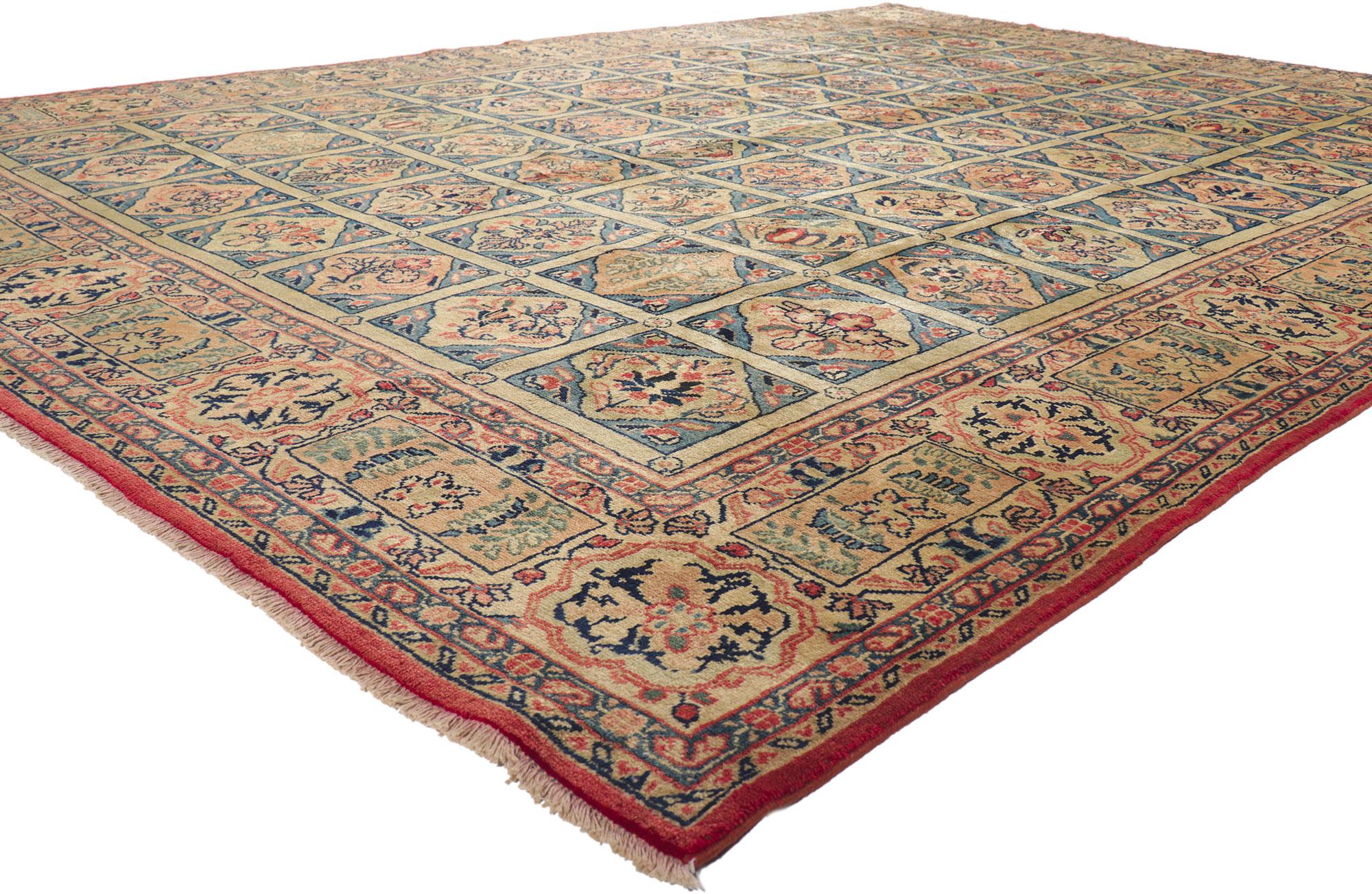 61198 Vintage Persian Mahal rug, 09'02 x 12'08.
Full of tiny details, this hand knotted wool vintage Persian Mahal rug is a captivating vision of woven beauty. The cleverly composed composition features a compartmental panel design showcasing an