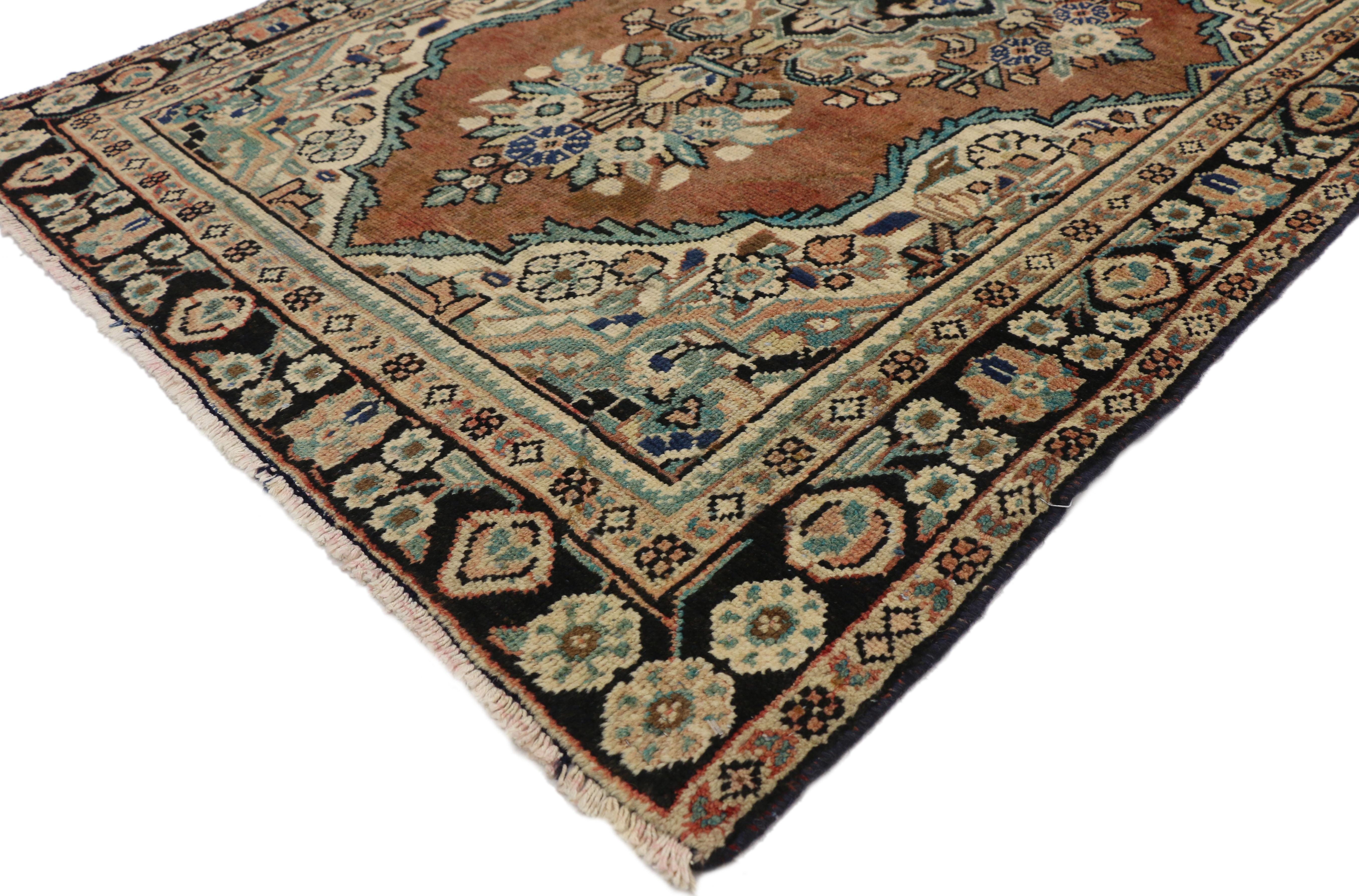 75182 Vintage Persian Mahal Rug with Rustic English Country Cottage Style 04'04 x 06'05. Boasting a floral bounty in a range of warm hues, this vintage Persian Mahal rug is a delightful example of English Country Cottage style. At the center of the