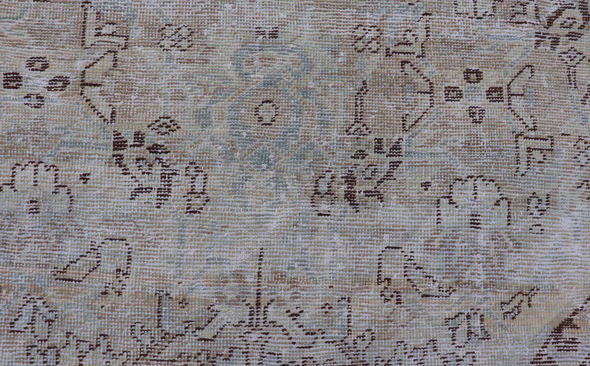 Vintage Persian Mahal rug with Sub-Geometric Design with Small Medallion 
Keivan Woven Arts / Country of origin: Iran; Type: Mahal; Design: Diamond Medallion, Floral Medallion; Keivan Woven Arts: Rug H-701-03. 
Measures: 7'0 x 9'11
This vintage