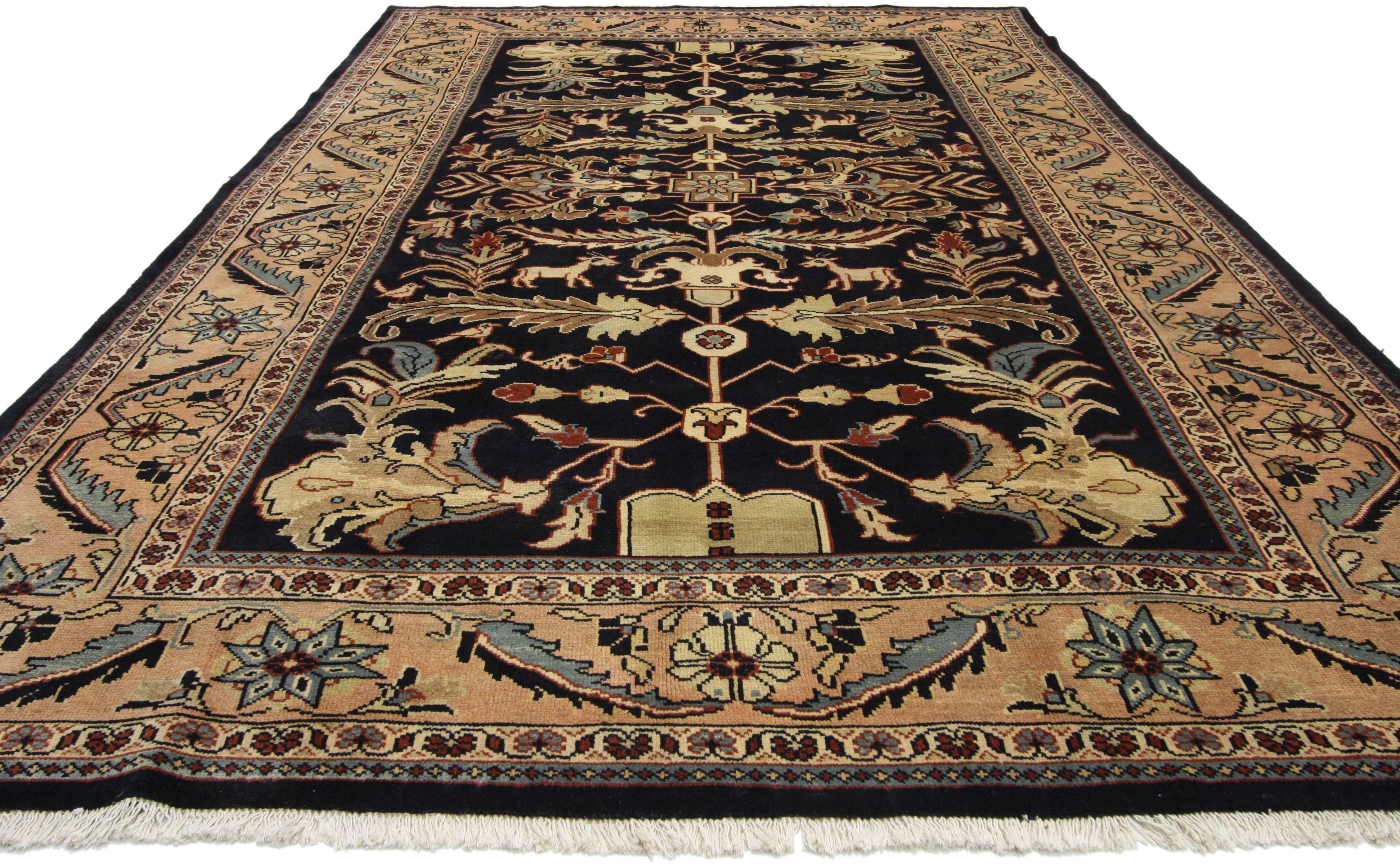 75832, vintage Persian Mahal rug with traditional style. This hand-knotted wool vintage Persian Mahal rug features a centre cruciform cross-like medallion with an all-over botanical pattern composed of serrated leaves, feather leaves, antelopes,