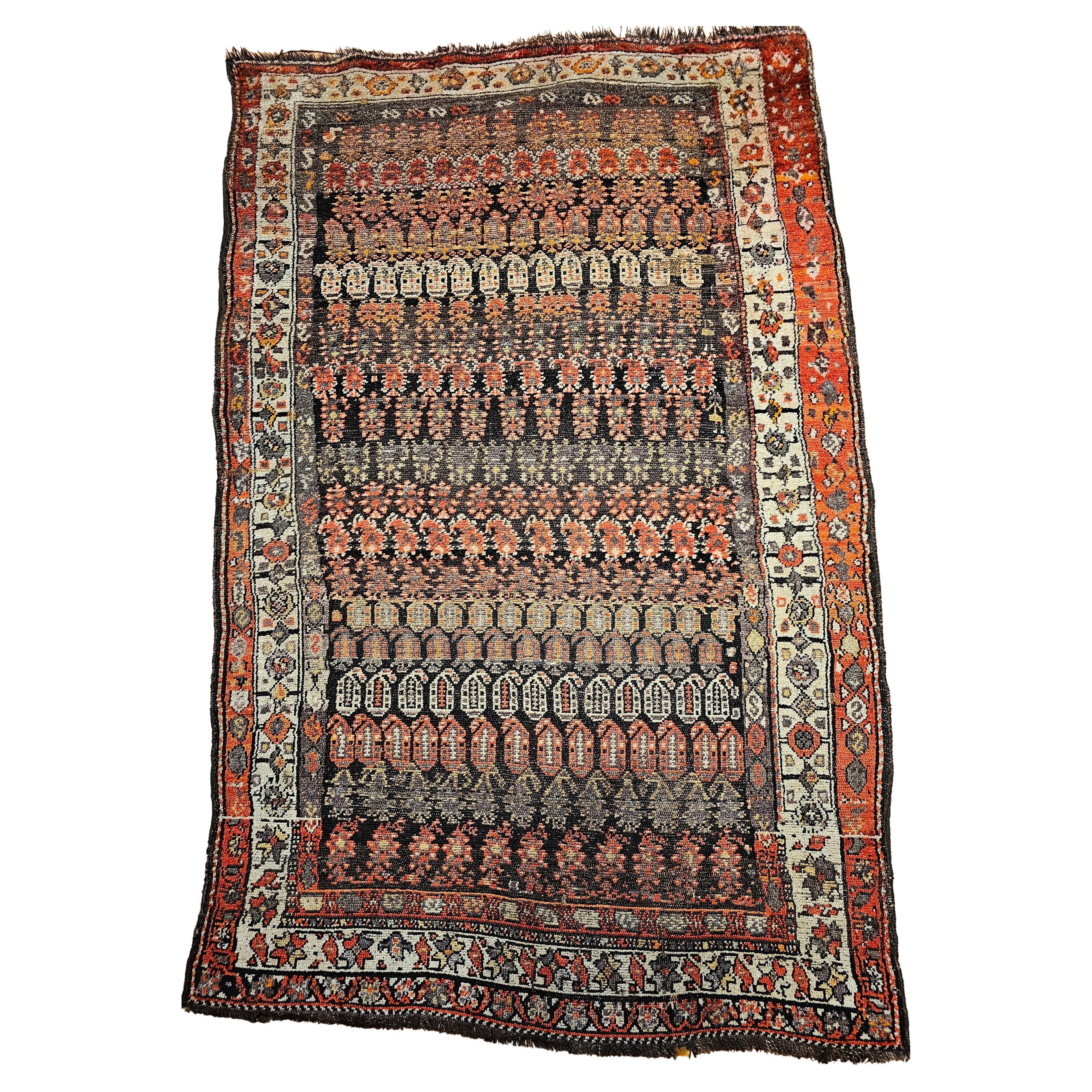 Alfombra Persa Malayer Vintage con diseño paisley en tonos marrones y rojos