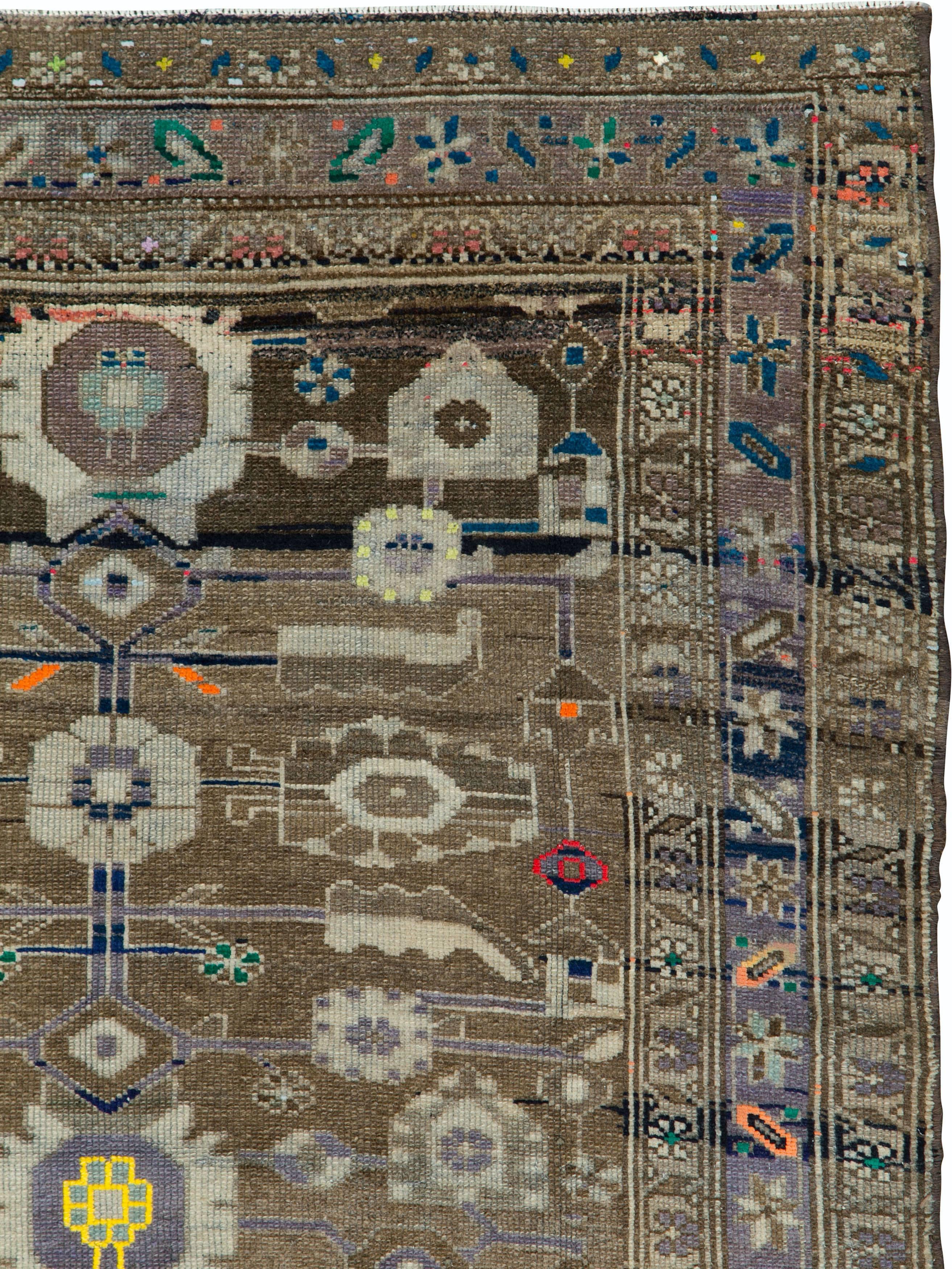 A vintage Persian Malayer rug from the mid-20th century with cotton highlights.