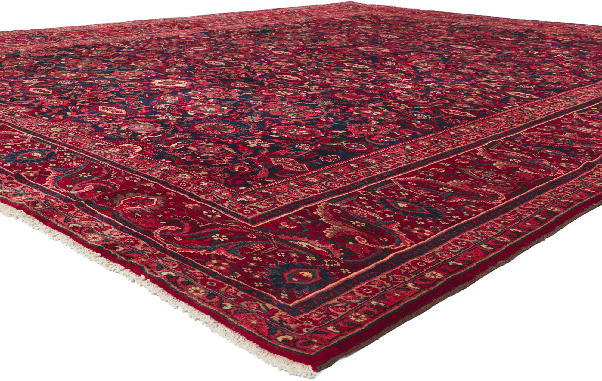 61186 Vintage Persian Malayer rug, 11'05 x 13'11. With its beguiling beauty and rich jewel-tones, this hand-knotted wool vintage Persian Malayer rug is poised to impress. The abrashed ink blue field is covered with a lively all-over botanical