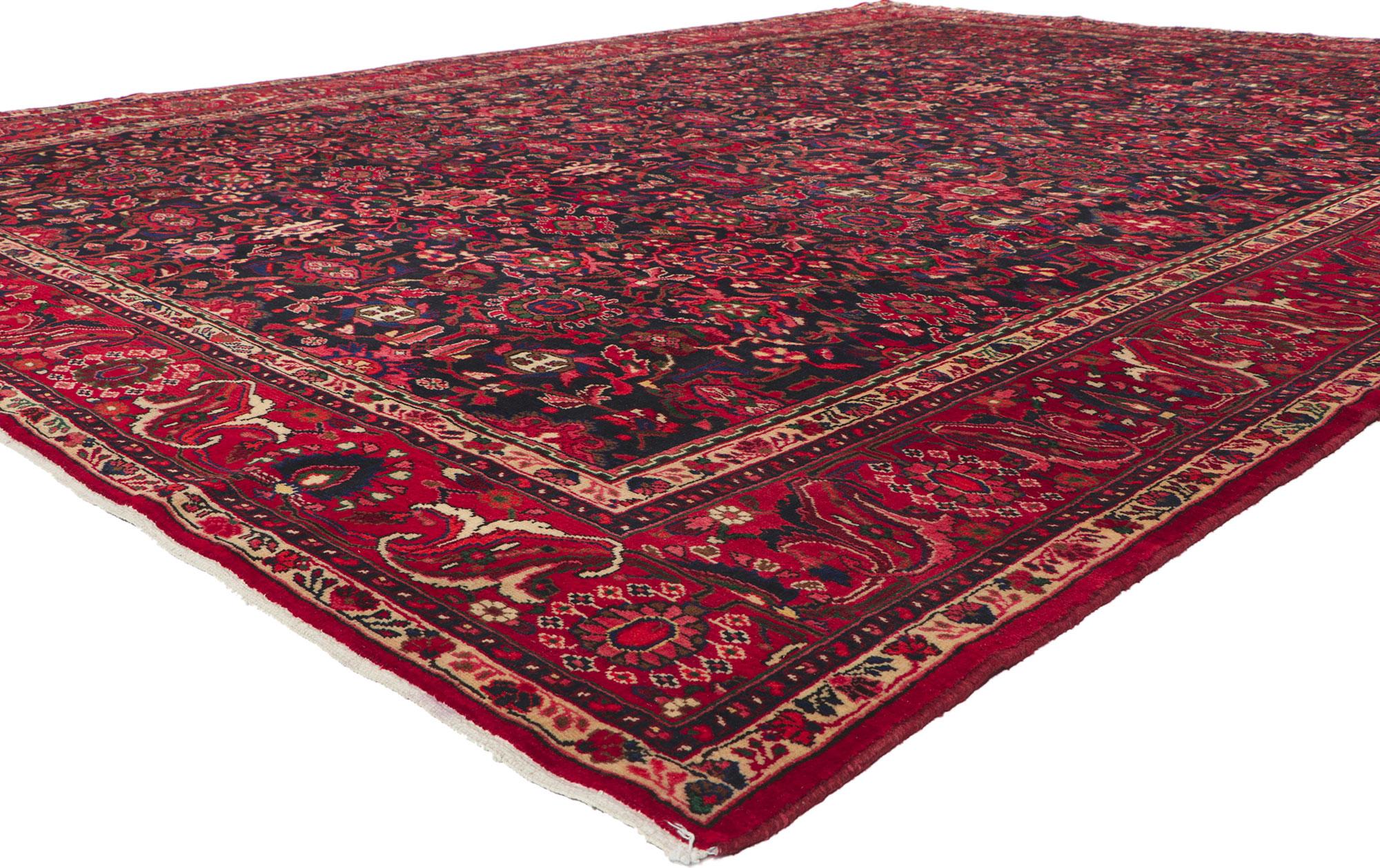 61203 vintage Persian Malayer rug 10'03 x 13'09. Eminating a timeless design and beguiling beauty in saturated colors, this hand-knotted wool antique Persian Malayer rug is poised to impress. An allover repeating botanical pattern spread across the