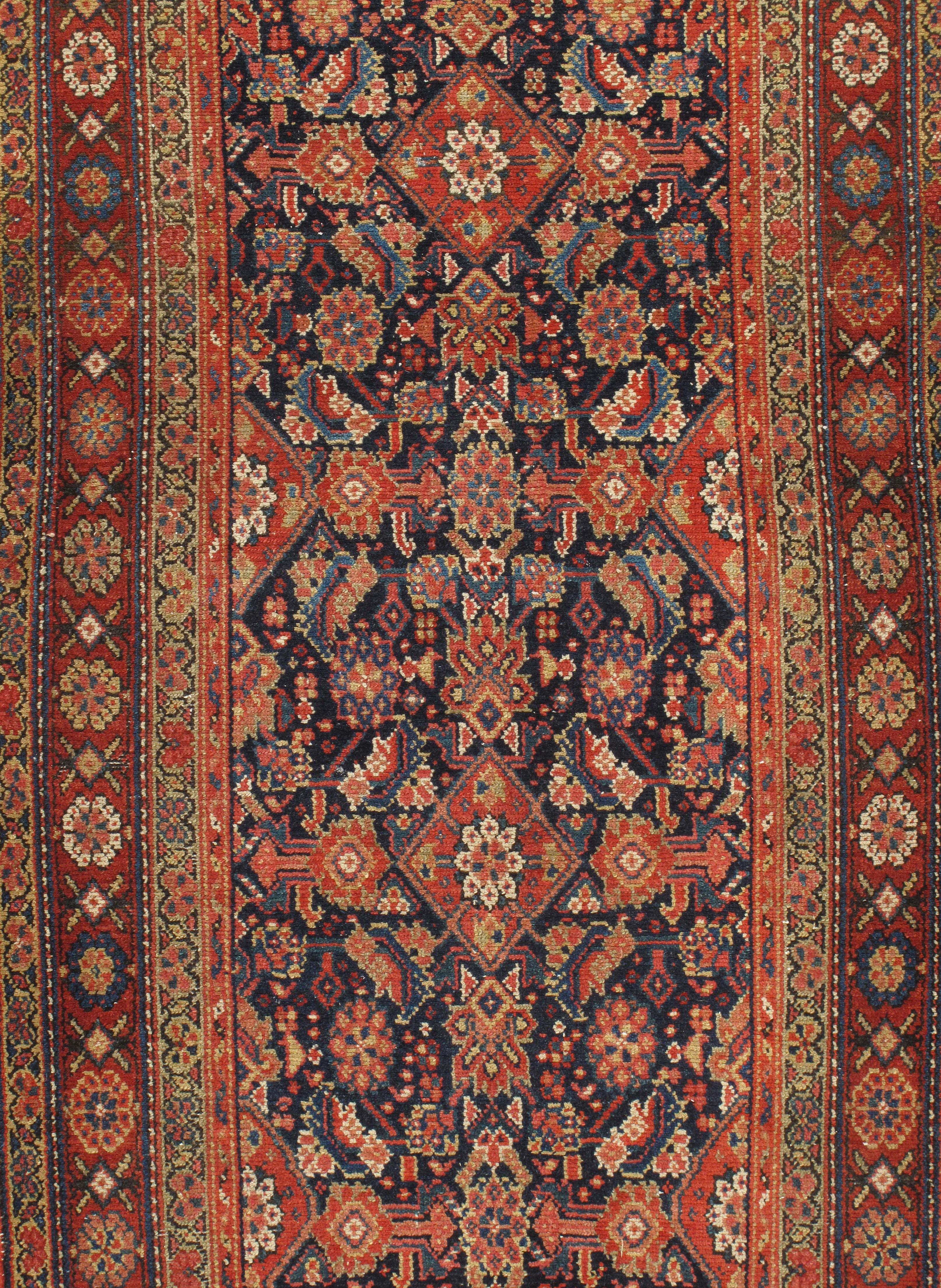 Vintage Persian Malayer rug Runner, circa 1920, 3'3 x 15'9. Vintage hand knotted Persian Malayer runner, circa 1920. The rug is in very good condition with a low pile that adds the patina so special in antique and vintage rugs. Colors: Deep