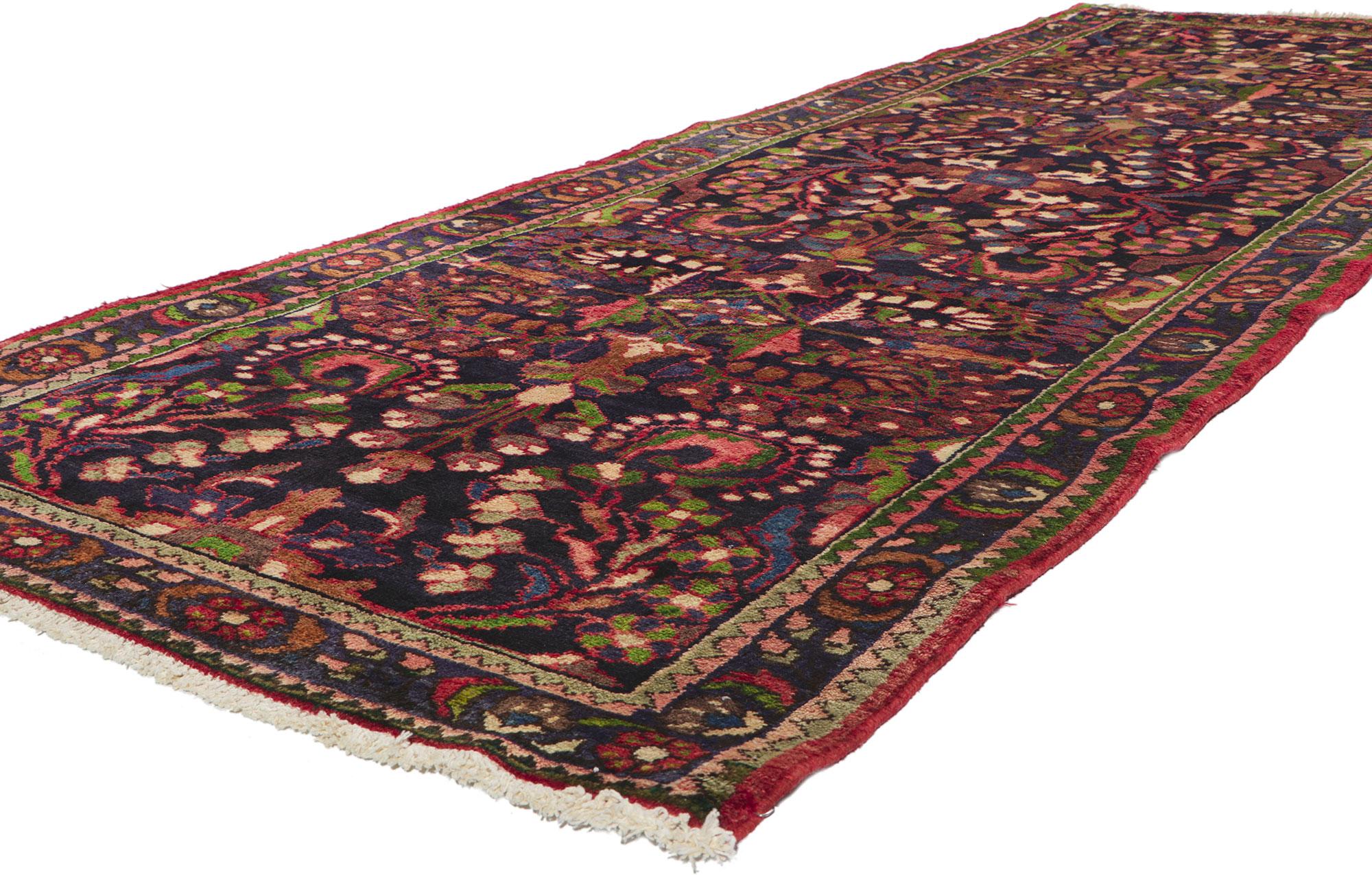 61047 Vintage Persian Malayer Rug, 03'08 x 10'00. Enter the captivating realm of this meticulously hand-knotted wool antique Persian Malayer rug—a masterful fusion of enduring floral design and a rich, traditional color spectrum. The midnight-hued