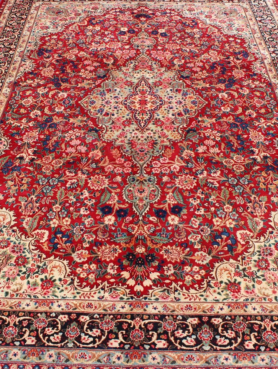20th Century Vintage Persian Mashad Rug with Ornate Floral Medallion Design in Red and Cream For Sale