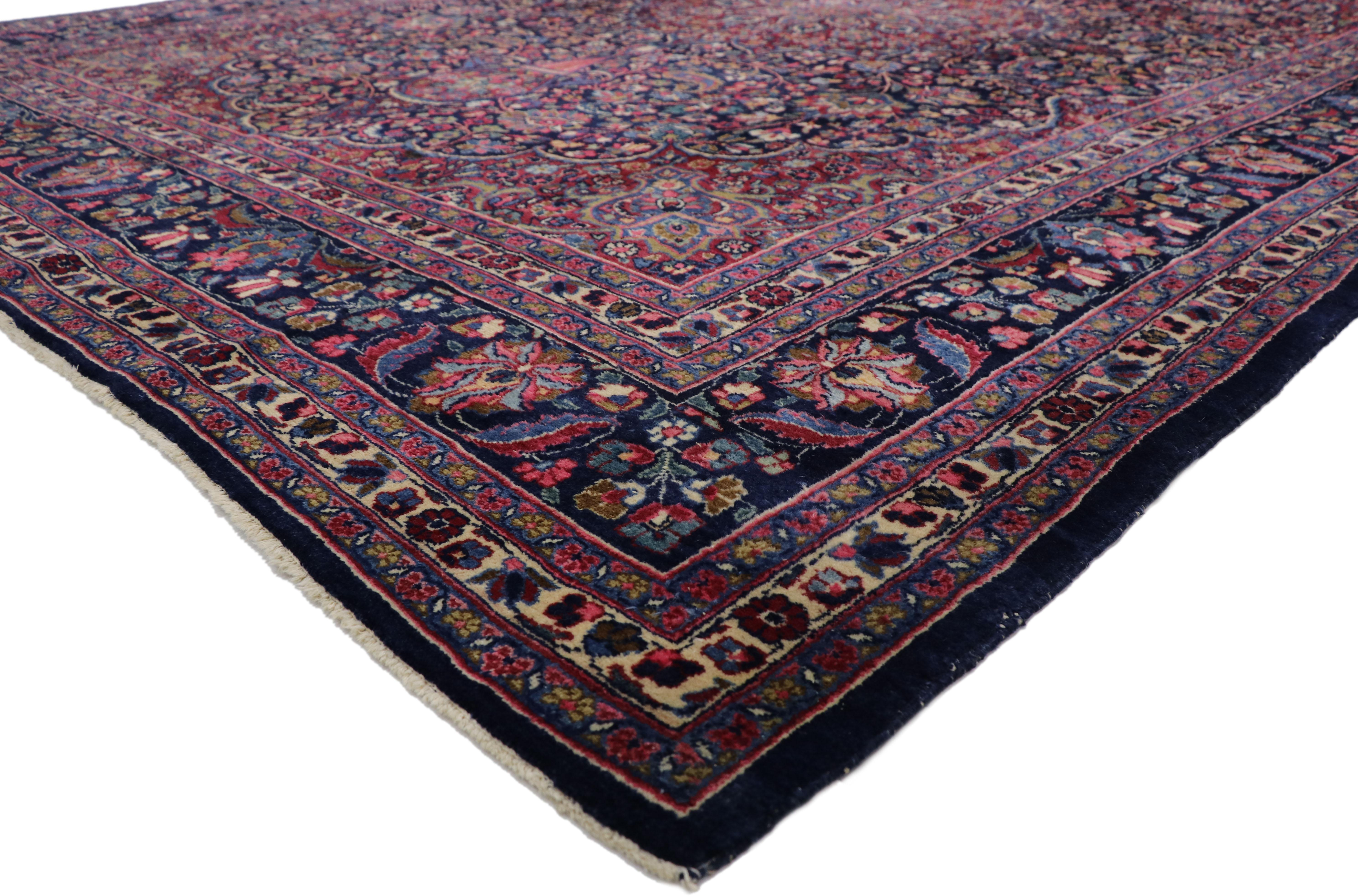 77355, vintage Persian Mashhad area rug with Arabesque baroque Regency style. Ravishing and vibrant this hand knotted wool vintage Persian Mashhad area rug features an eight-point cusped palmette medallion enclosed within a sixteen-point Mashhad
