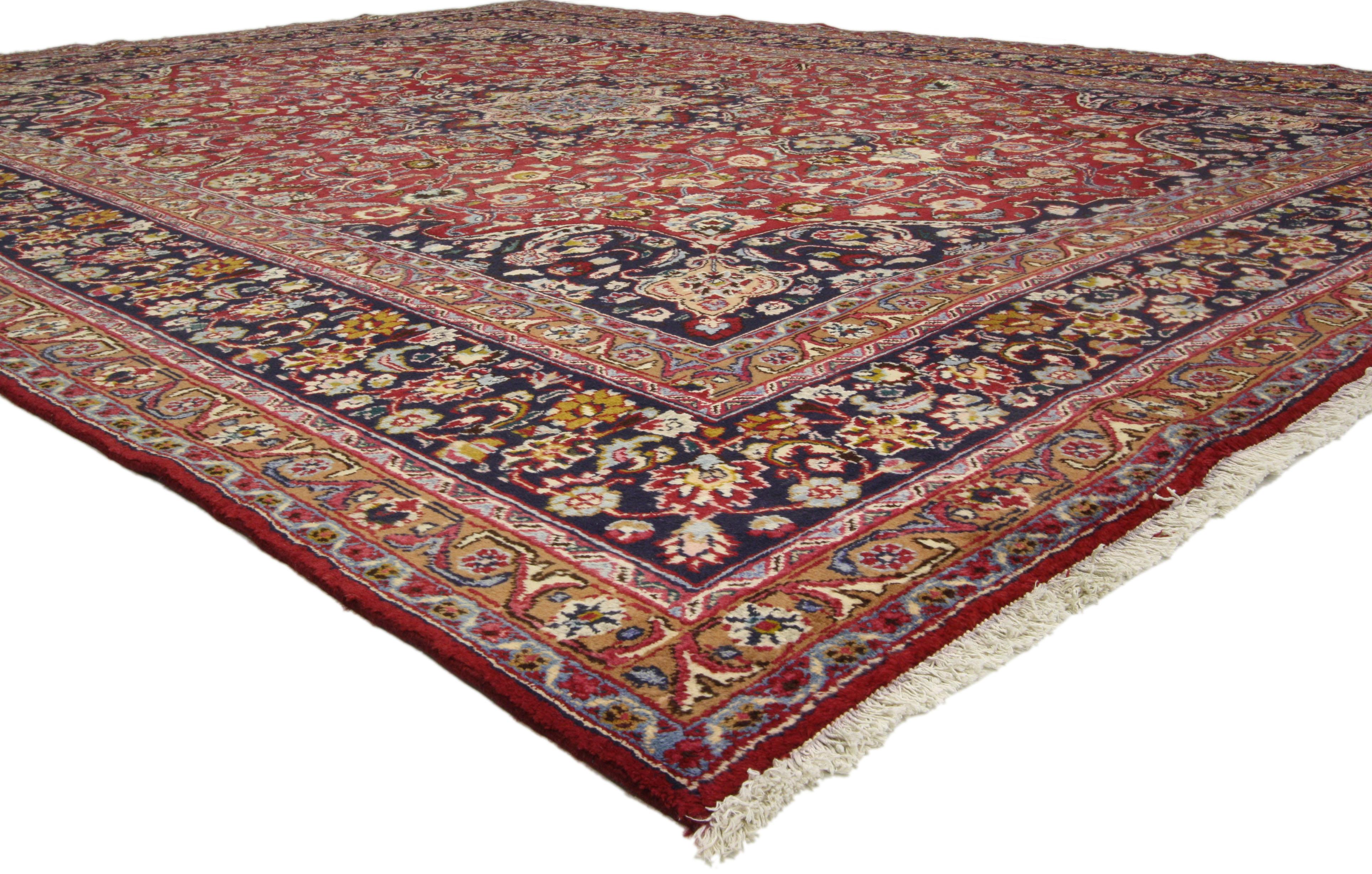 74946 Vintage Red Persian Mashhad Rug, 09'07 X 12'09. Ravishing and refined, this hand-knotted wool vintage Persian Mashhad area rug exudes elegance with its intricate design. At its center lies an eight-point cusped palmette medallion, surrounded
