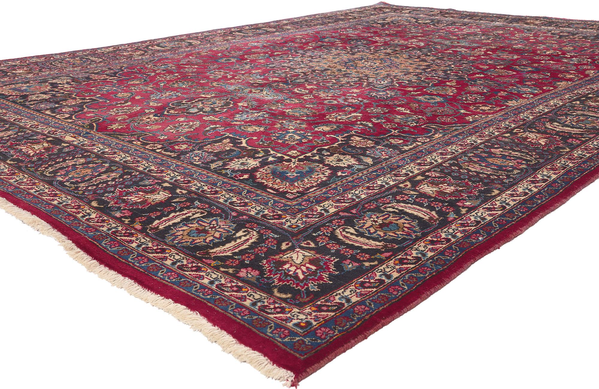 75540 Vintage Persian Mashhad Rug, 08'01 x 11'06.
Stately decadence meets traditional sensibility in this hand knotted wool vintage Persian Mashhad rug. The highly decorative floral design and sophisticated color palette woven into this piece work