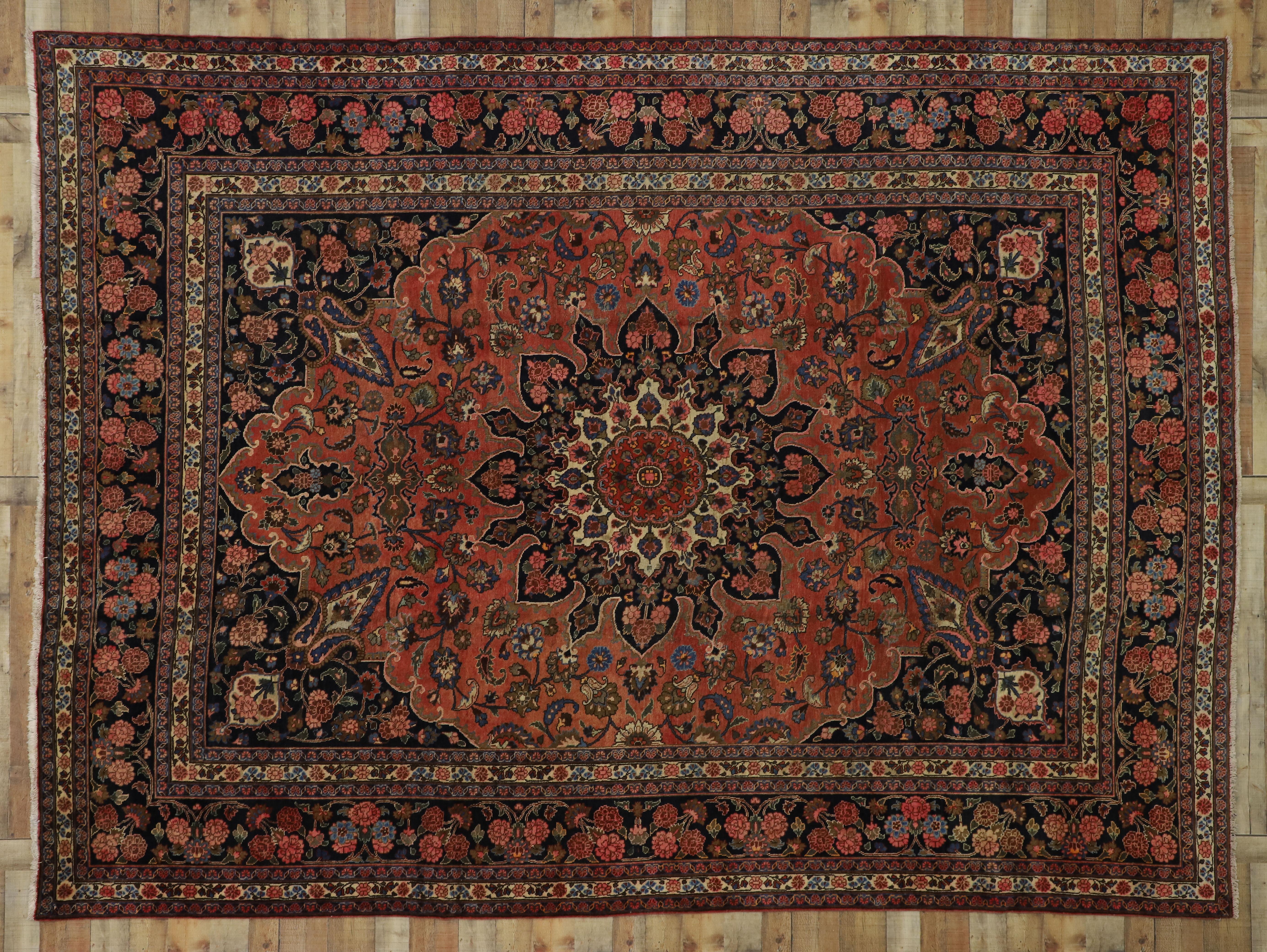 20th Century Vintage Persian Mashhad Area Rug with Traditional Style For Sale