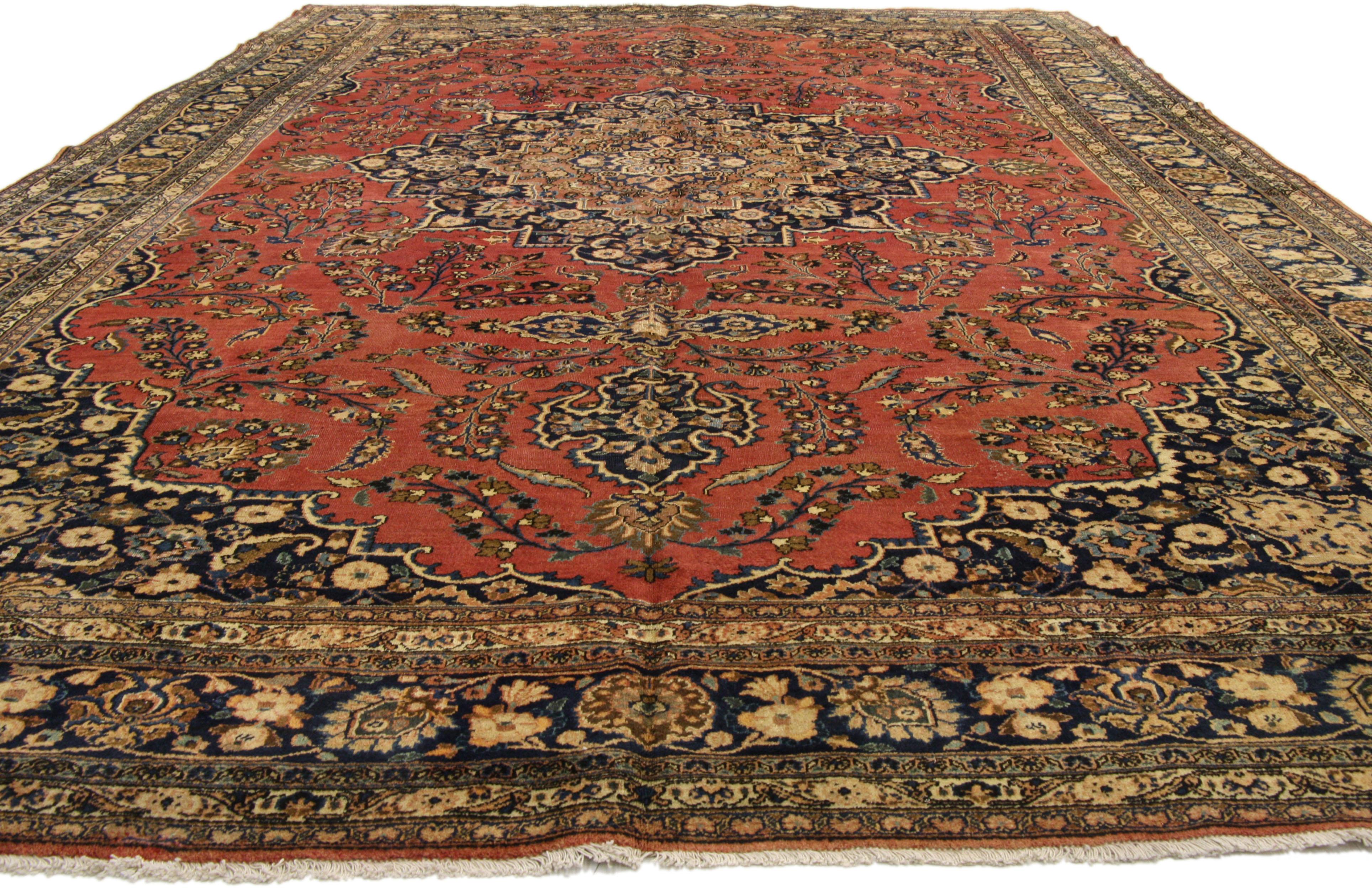 75598, vintage Persian Mashhad Gallery rug with traditional Jacobean style. This hand-knotted wool vintage Persian Mashhad rug features a cusped 16-point Mashhad medallion flanked by cartouche-style palmette finials at each end floating among