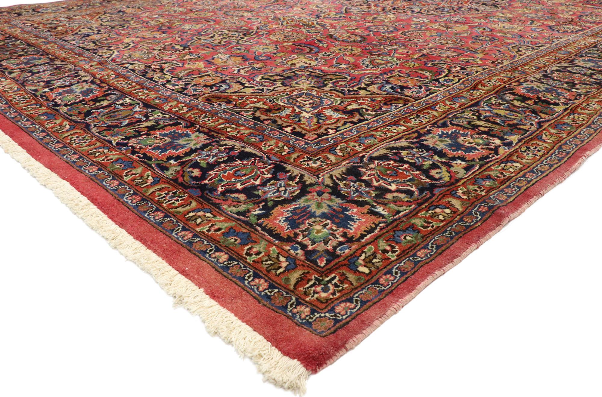 75202 Vintage Persian Mashhad Rug, 09'06 x 16'00. 
Rich in color, texture and beguiling ambiance, this hand-knotted wool vintage Persian Mashhad rug beautifully displays timeless elegance and regal charm. A stunning testament to traditional Persian