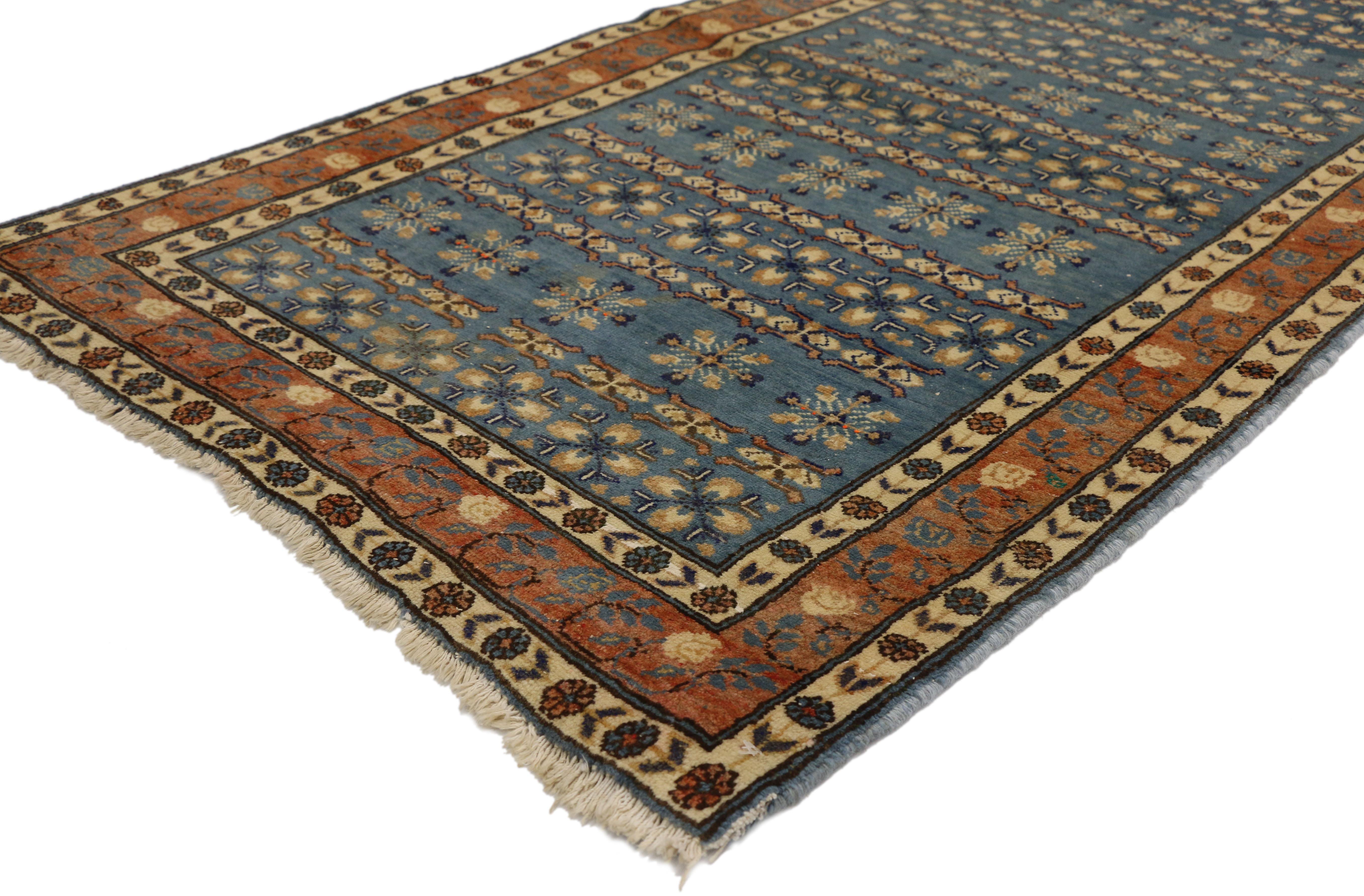 75177, vintage Persian Mashhad rug accent rug. With its ornate detailing and well-balanced symmetry, this hand knotted wool vintage Persian Mashhad rug highlights both Renaissance and Jacobean style. Alternating horizontal rows of stylized florals