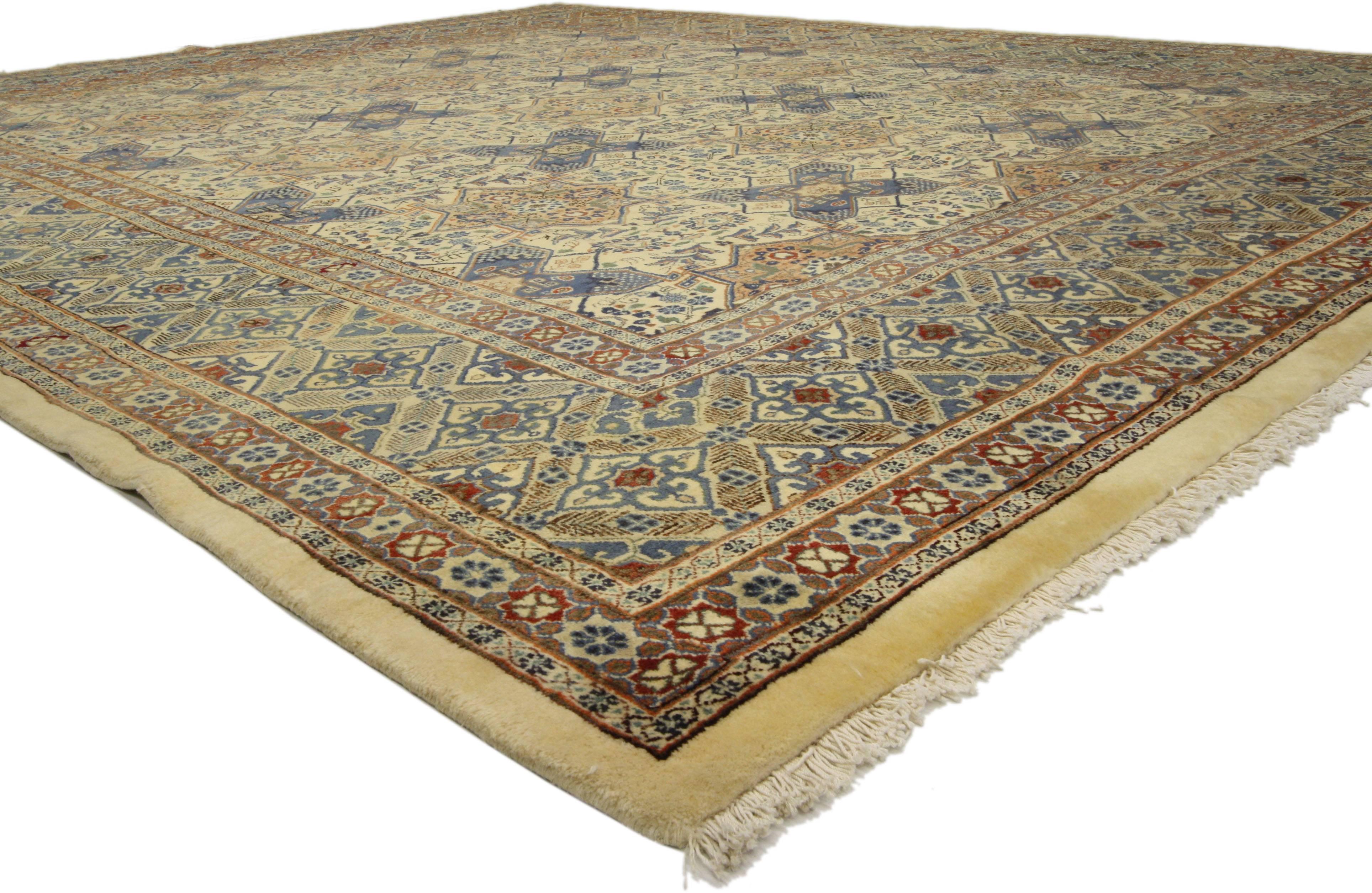 76305, vintage Persian Mashhad Area rug with Islamic Art Design. Elegant and captivating, this hand knotted wool vintage Persian Mashhad rug features an Islamic Quatrefoil Tile Artwork design composed of an all-over geometric pattern of interlocking