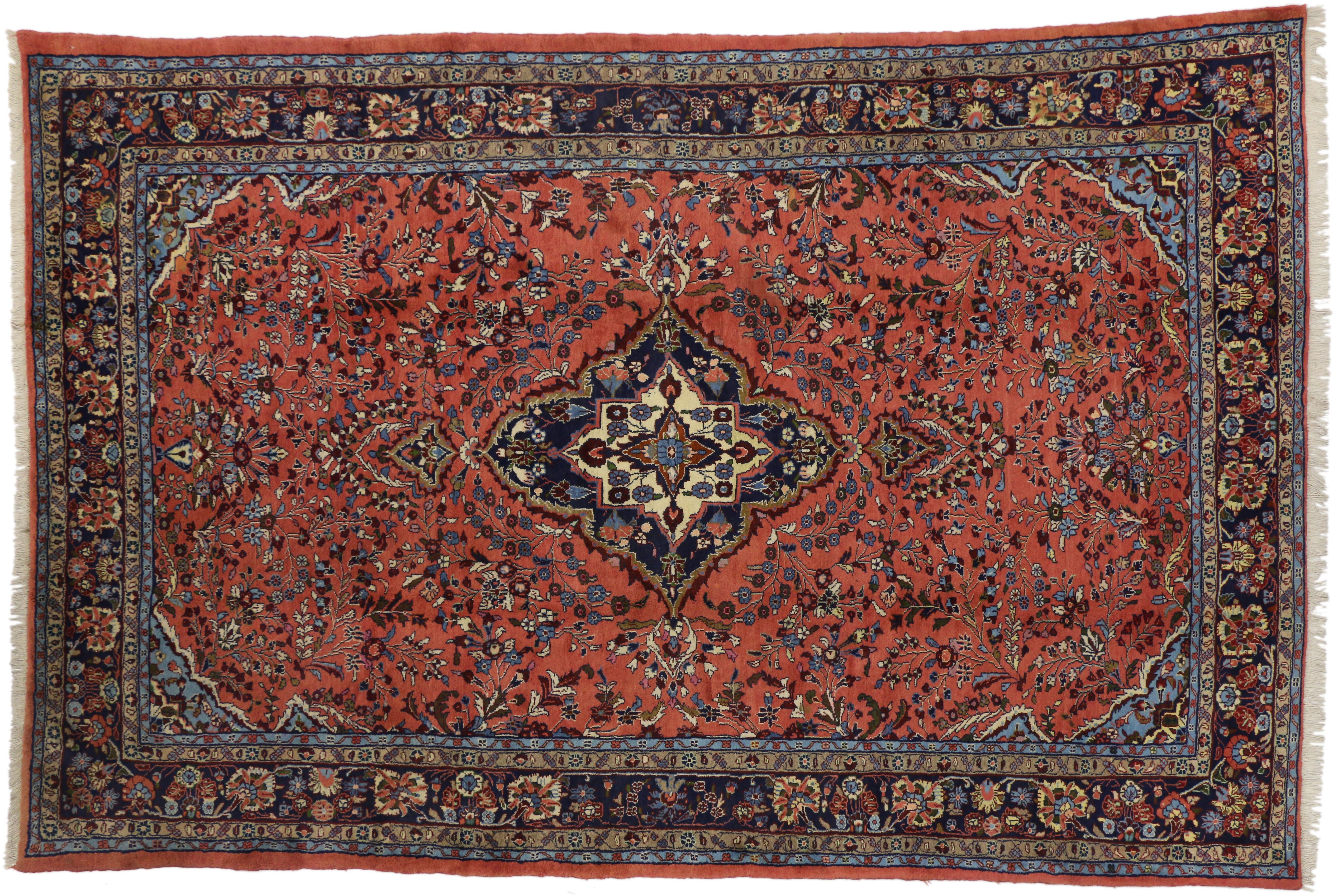 60340, vintage Persian Mehraban rug with traditional style. This lovely hand-knotted wool vintage Persian Mehraban rug features a navy blue and ivory lobed medallion surrounded by allover floral sprays and blooming palmettes. Sky-blue corner