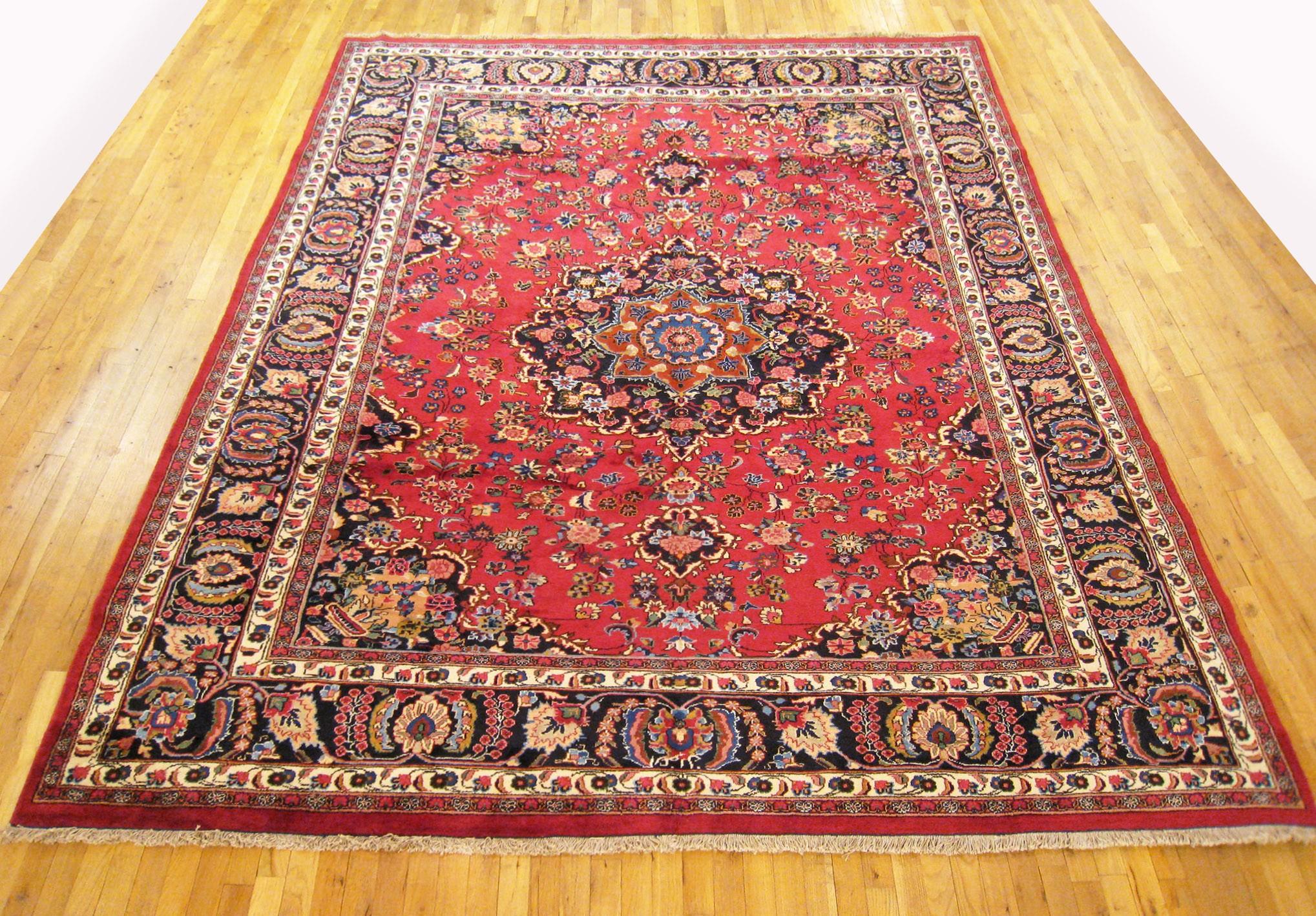 Vintage Persian Meshed Oriental rug, Room size

A vintage Persian Meshed oriental rug, size 11'7