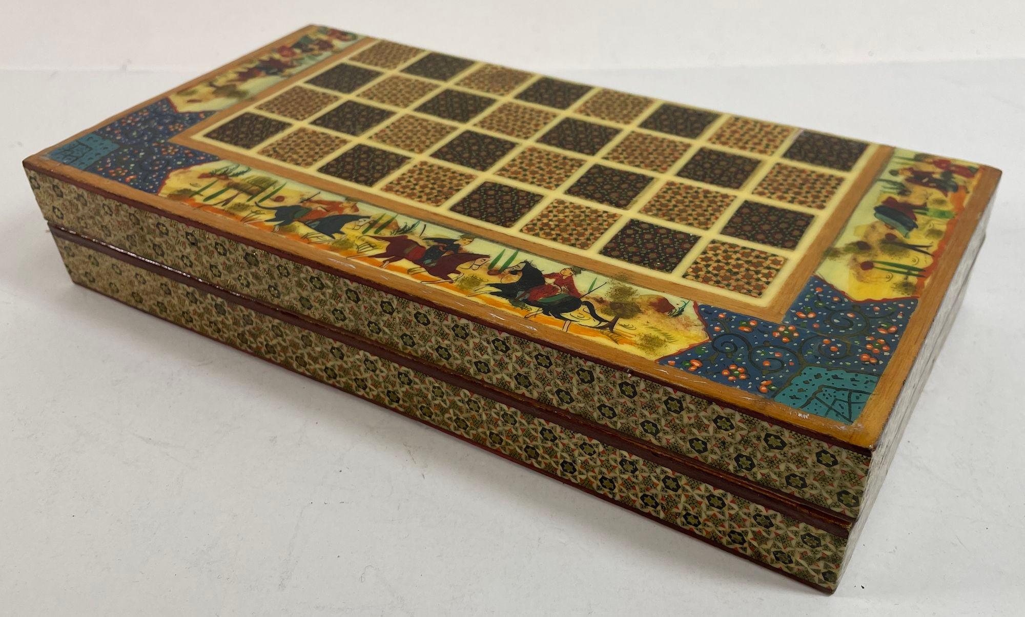 Vintage Persian Micro Mosaic Chess Game Box.
Intricately inlaid handcrafted Persian styled chess game board box.
Handcrafted beautiful Middle Eastern Moorish style Khatam chess board covered with very delicate micro mosaic marquetry from the ancient